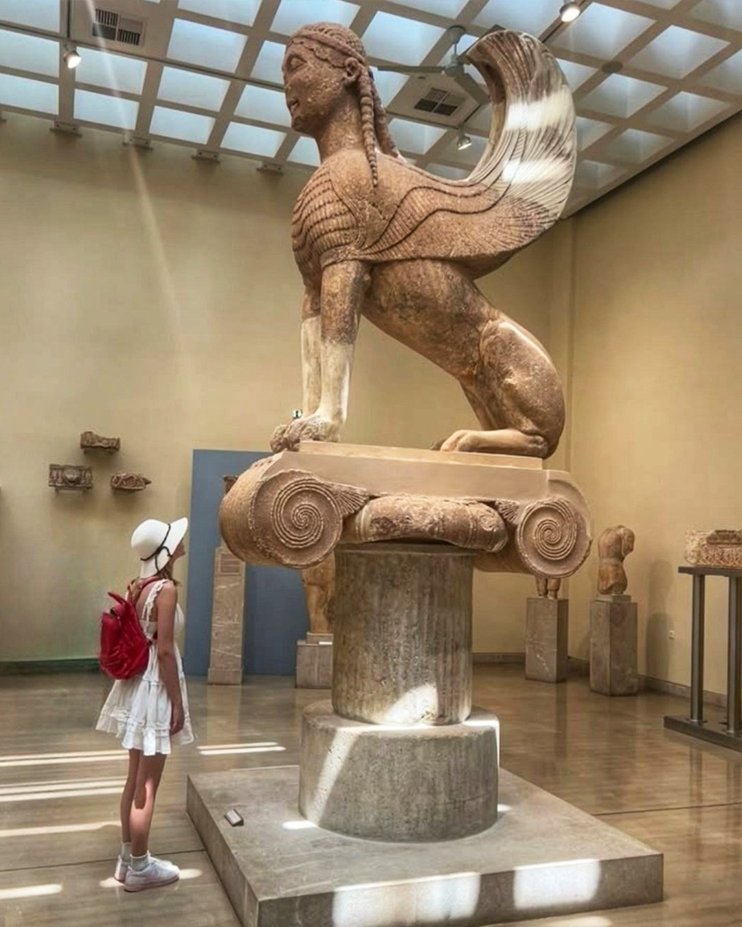 Greeks - 🏛🟦🏛 She once loomed high above Delphi, silent and watchful ...