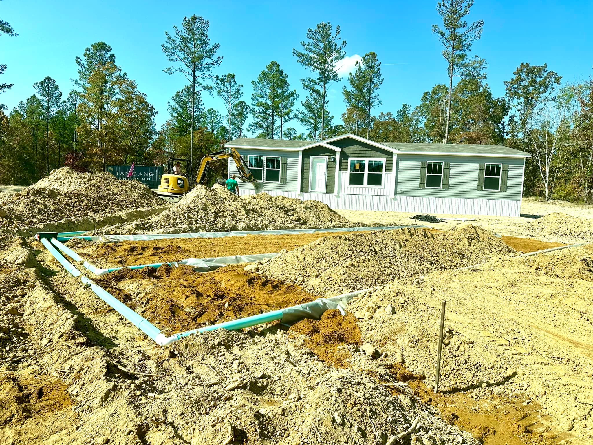 Redeemed - ASTM C33 sand in place and cover dirt going down. | Facebook