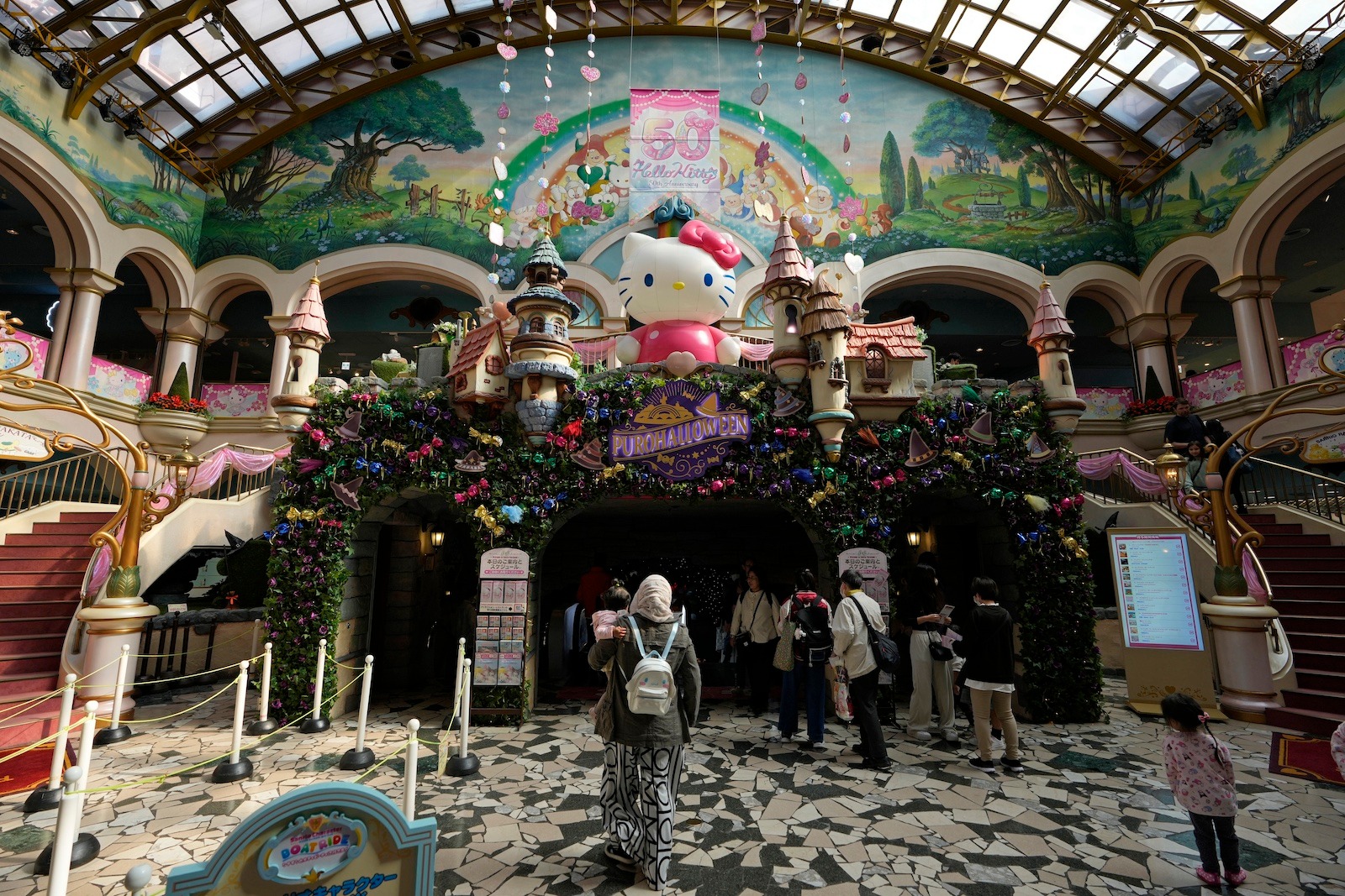Hello Kitty figures, presented as algae, are displayed inside the