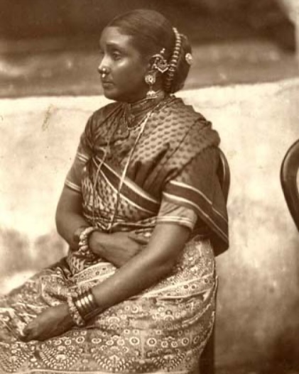 tamil ladies dress Women in Sari, in this style the lose end is warped around the waist. 1880s #Tamil #Women motorcycle rally outfit