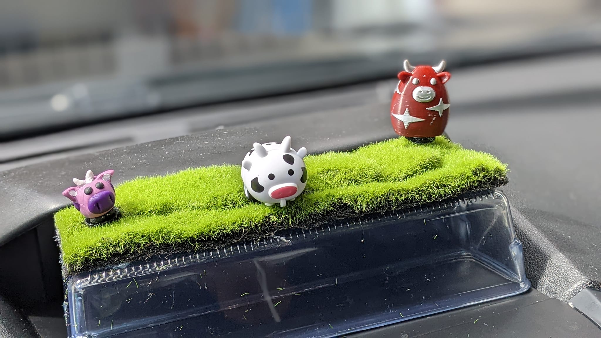 DIY moose display for Subaru using drawer organizer and fake moss