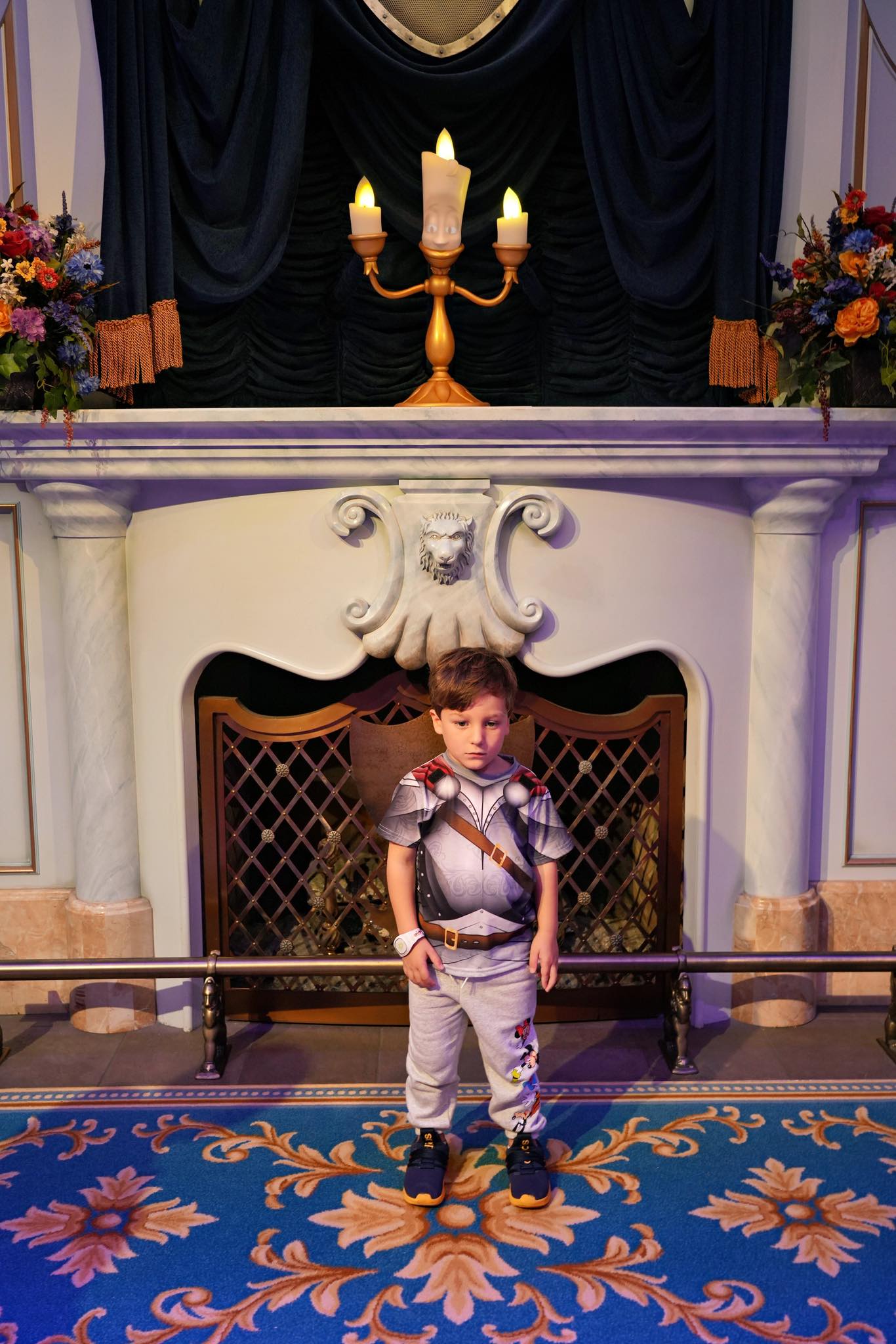 When your child kicks Belle out of his pic with Lumiere. | Facebook