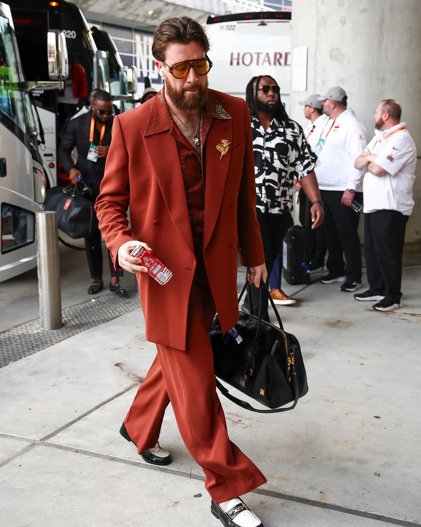 Travis Kelce rocking the shorts suit for the Super Bowl rematch vs 
