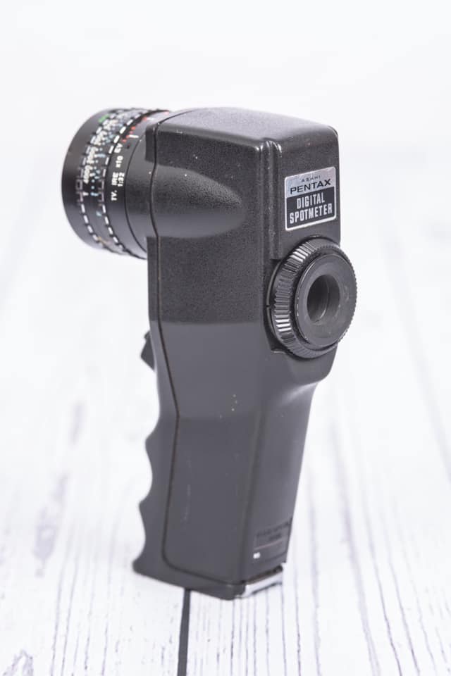 It's a pentax k100d 6.1mp digital slr camera with an 18-55mm, I