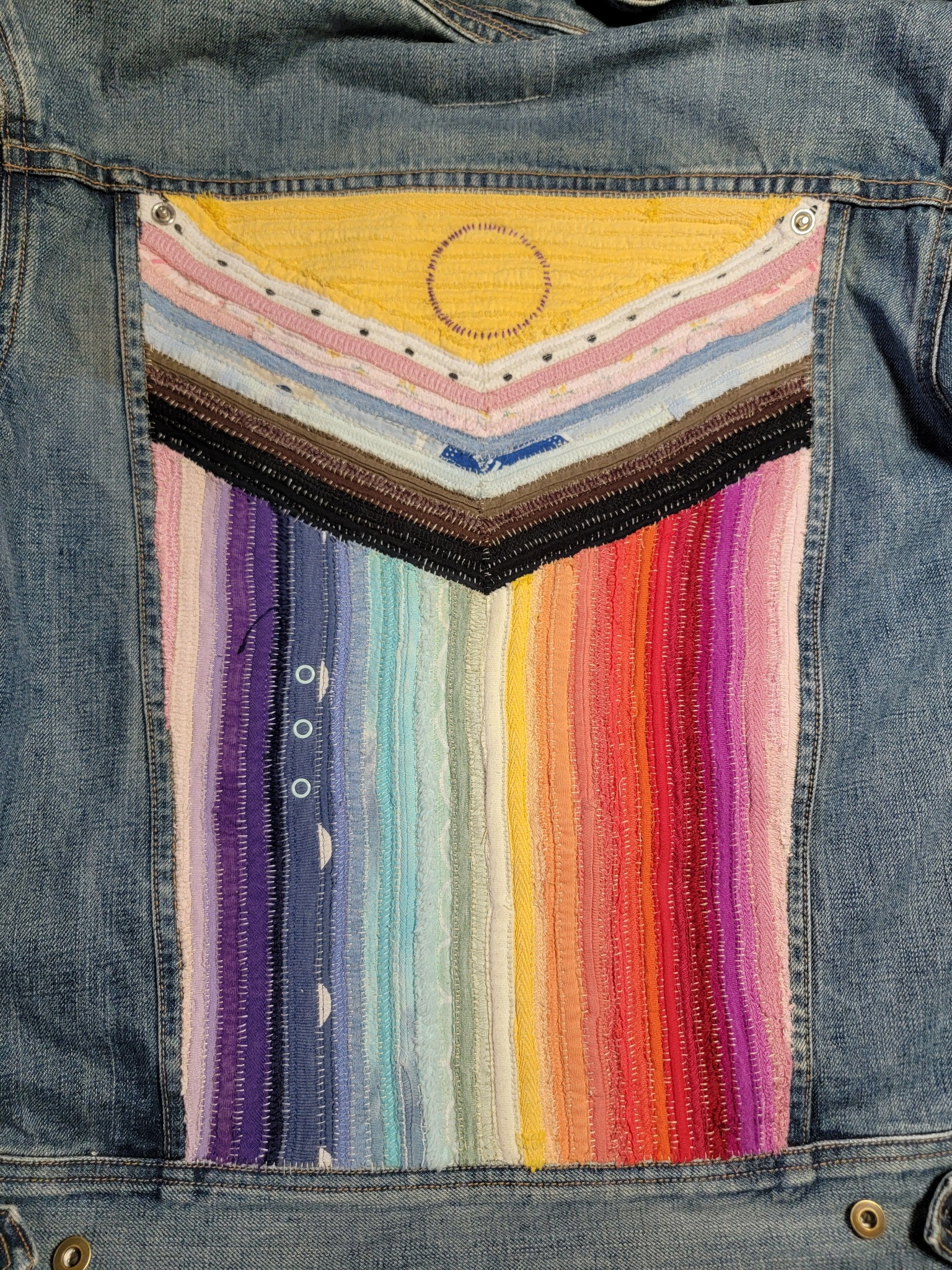 Upcycled progress pride flag denim jacket