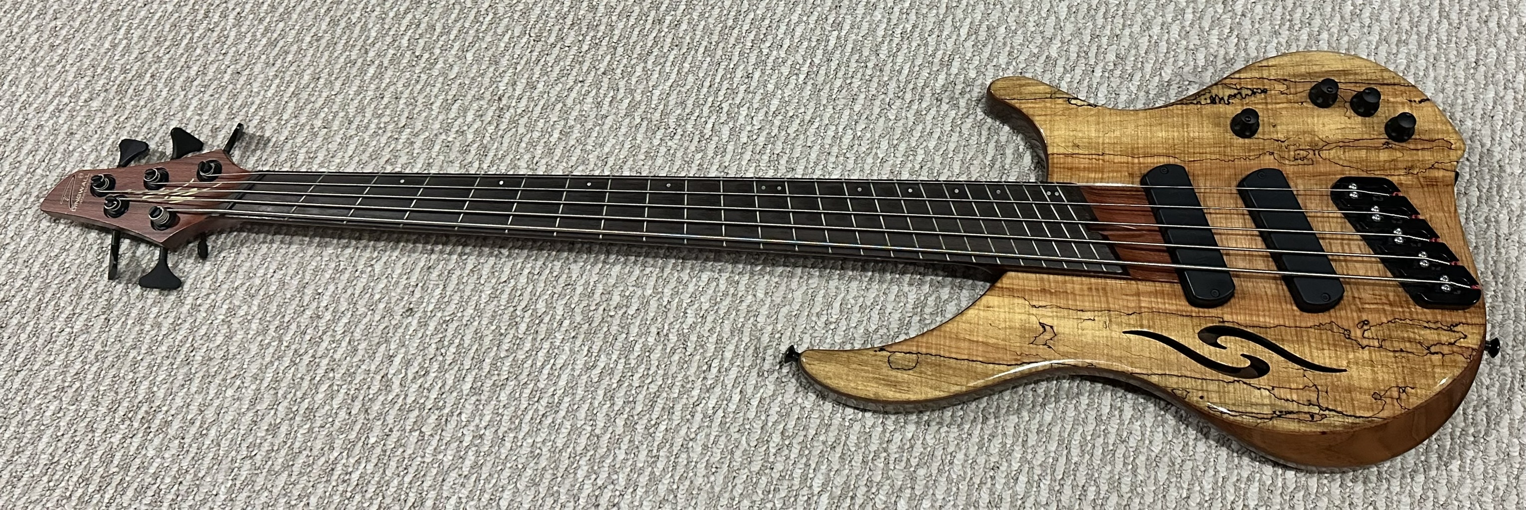 Check out this Dingwall ABI five-string in a Purple-to-Turquoise