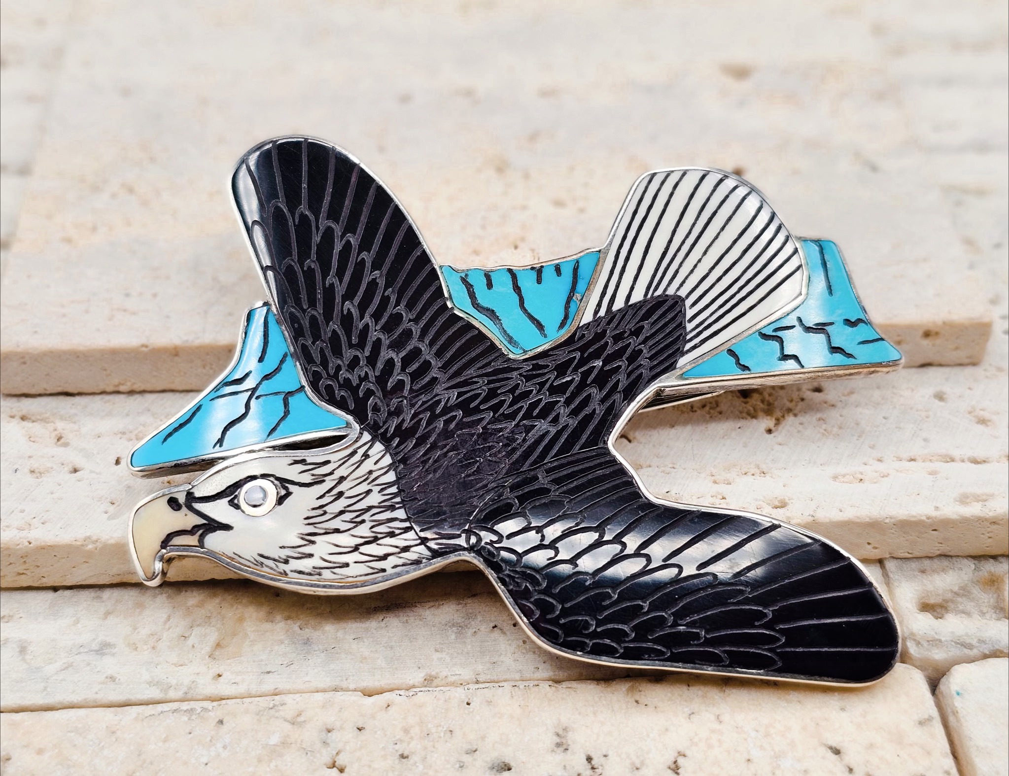 An incredibly beautiful pin / pendant by Harlan and Monica Coonsis