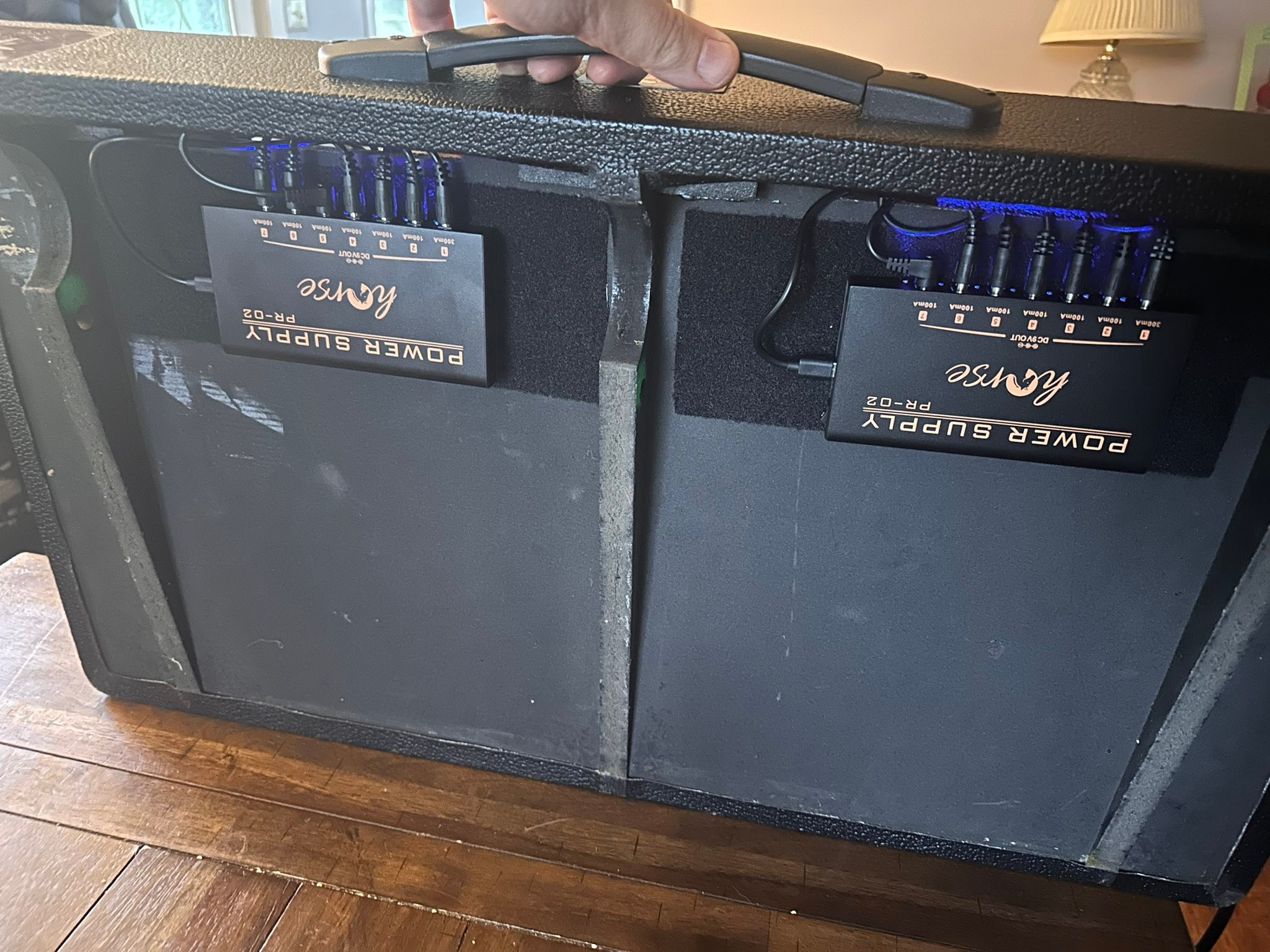 Why is my pedal board causing a humming distortion buzz?