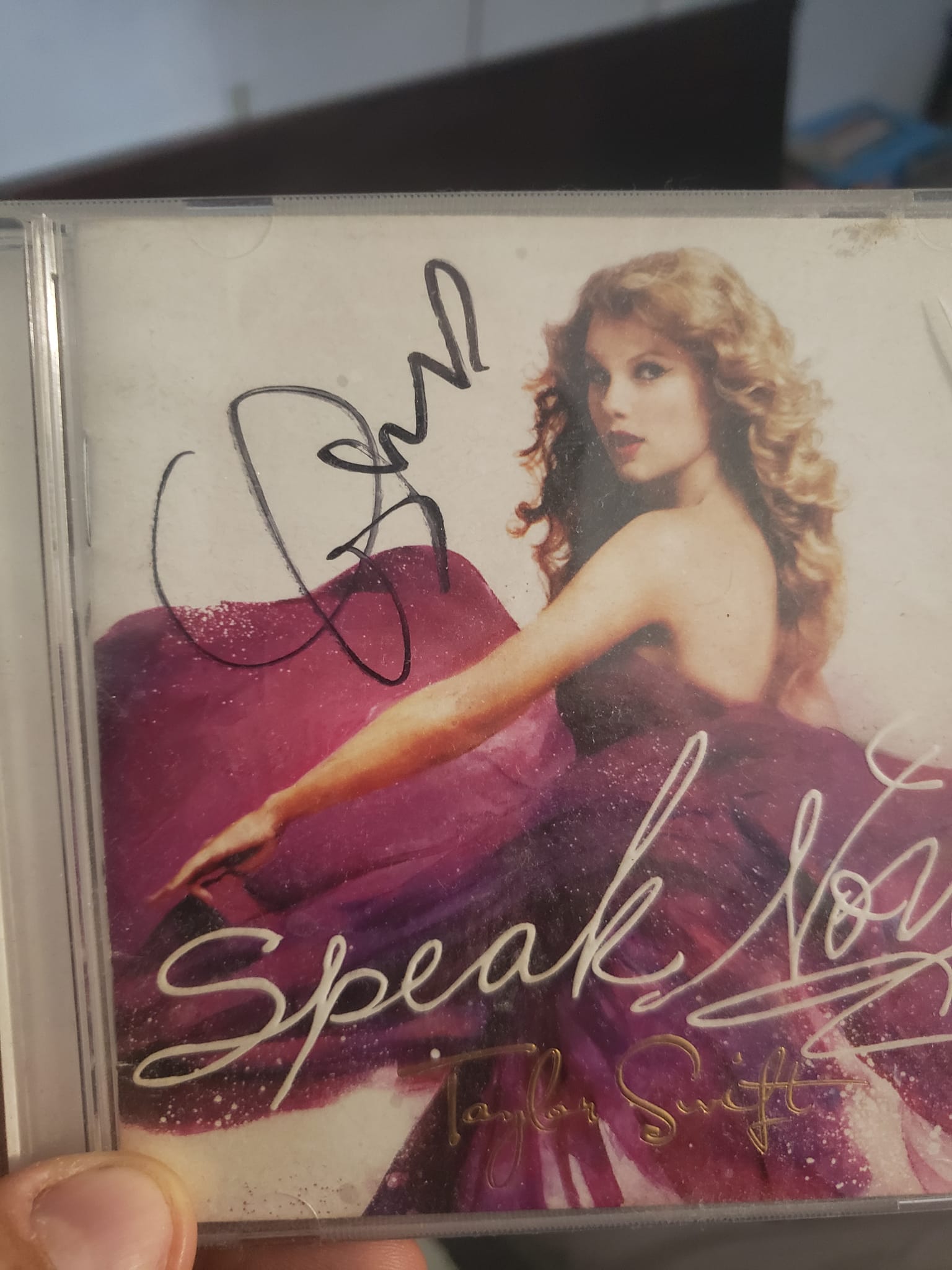 Is my Taylor Swift signed album authentic despite signature 