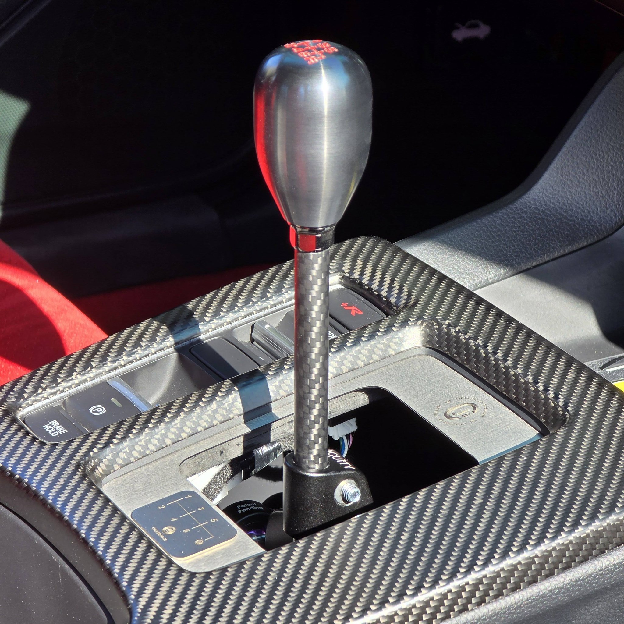 Better shots of the carbon rod for Acuity shifters I am nearing