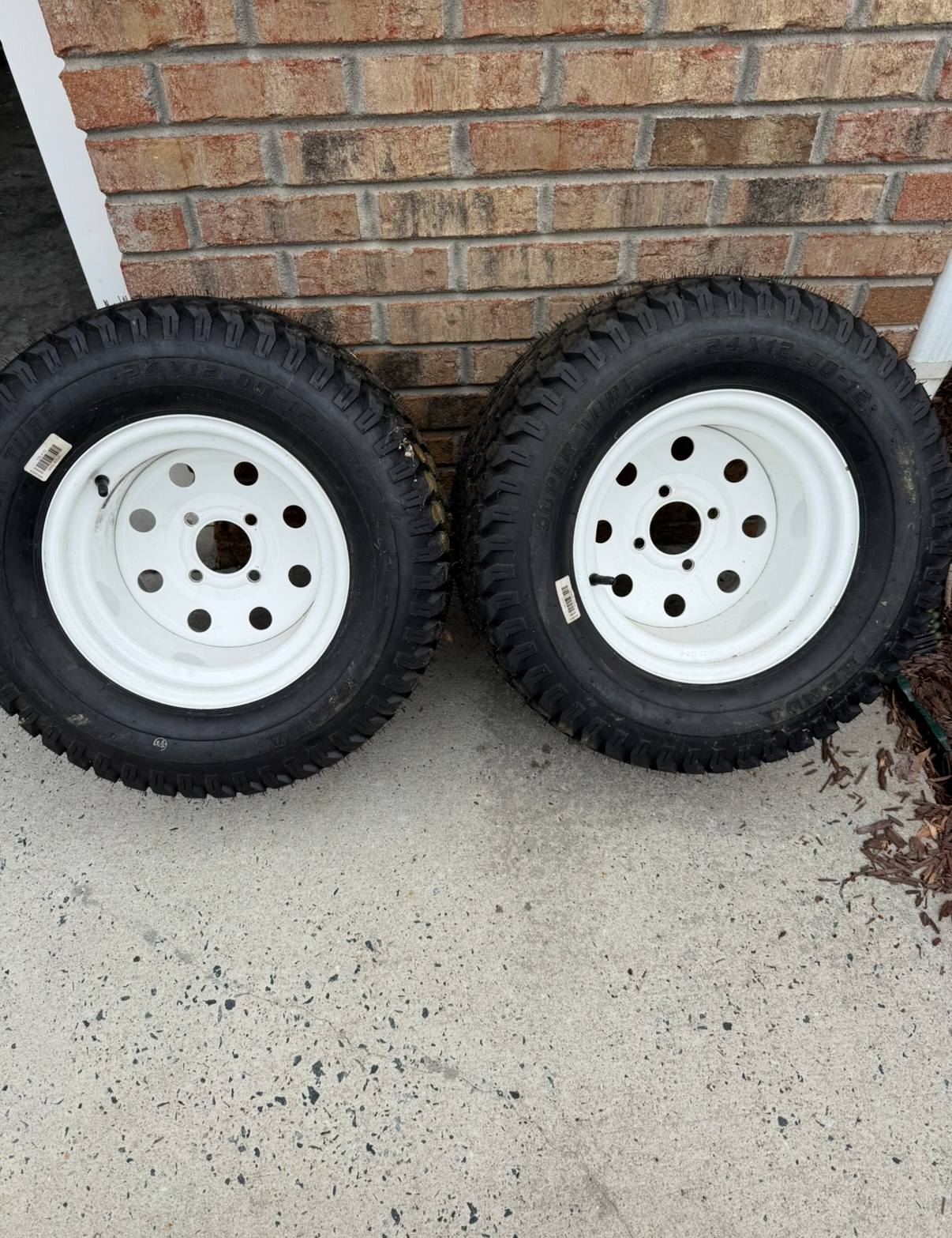 eXmark Lazer Z X-Series rims and tires for sale in Greensboro, NC