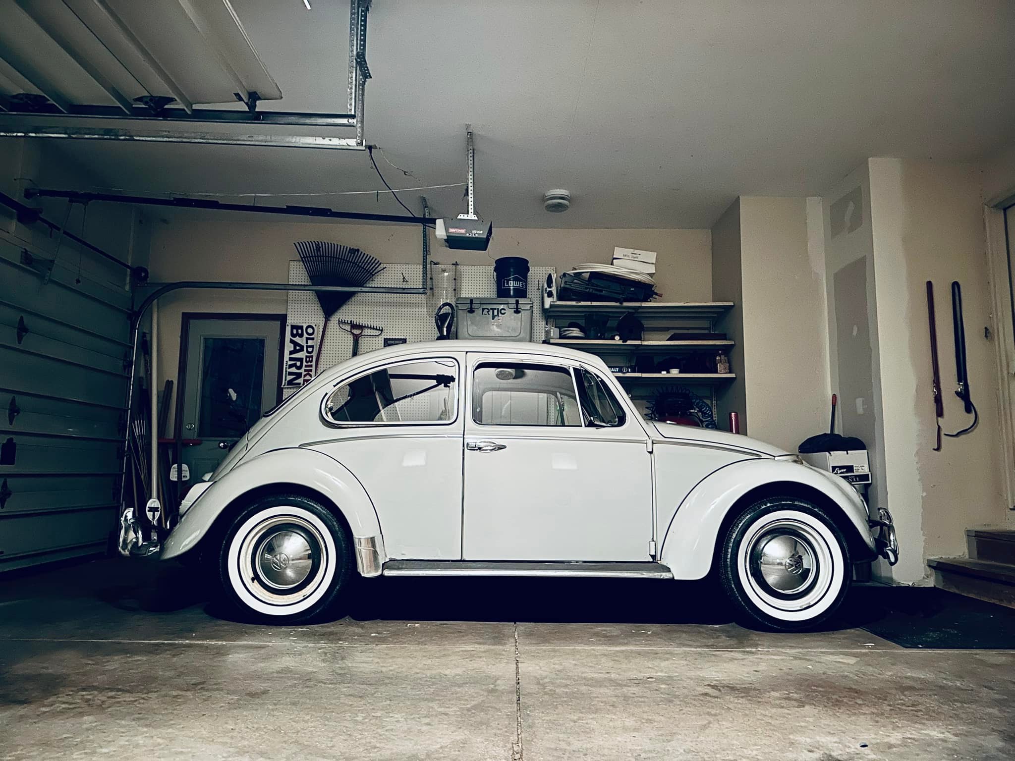 New white wheels installed on vintage Volkswagen