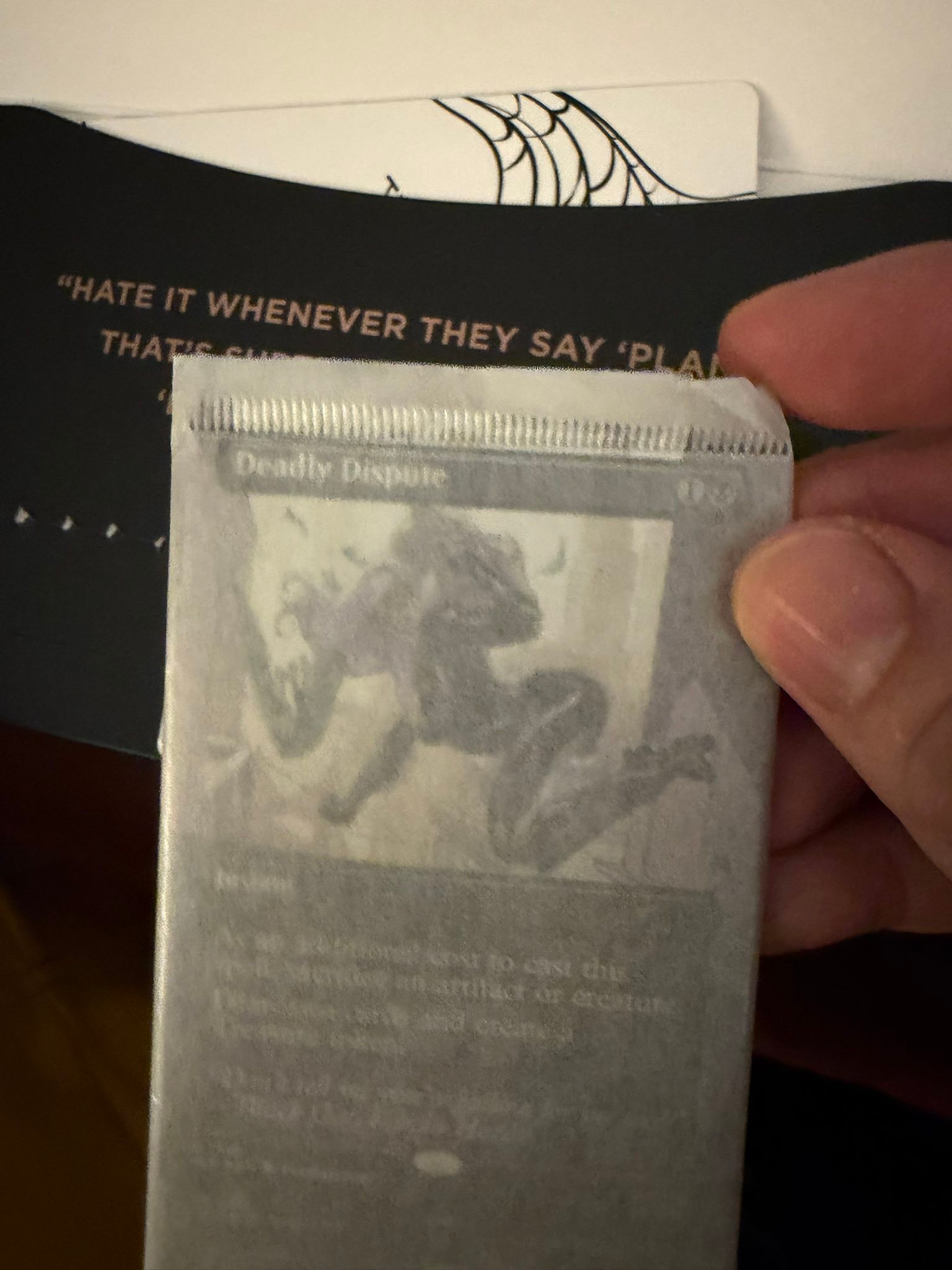Is a crimped Villainous Plots foil pack with stuck Deadly Dispute 