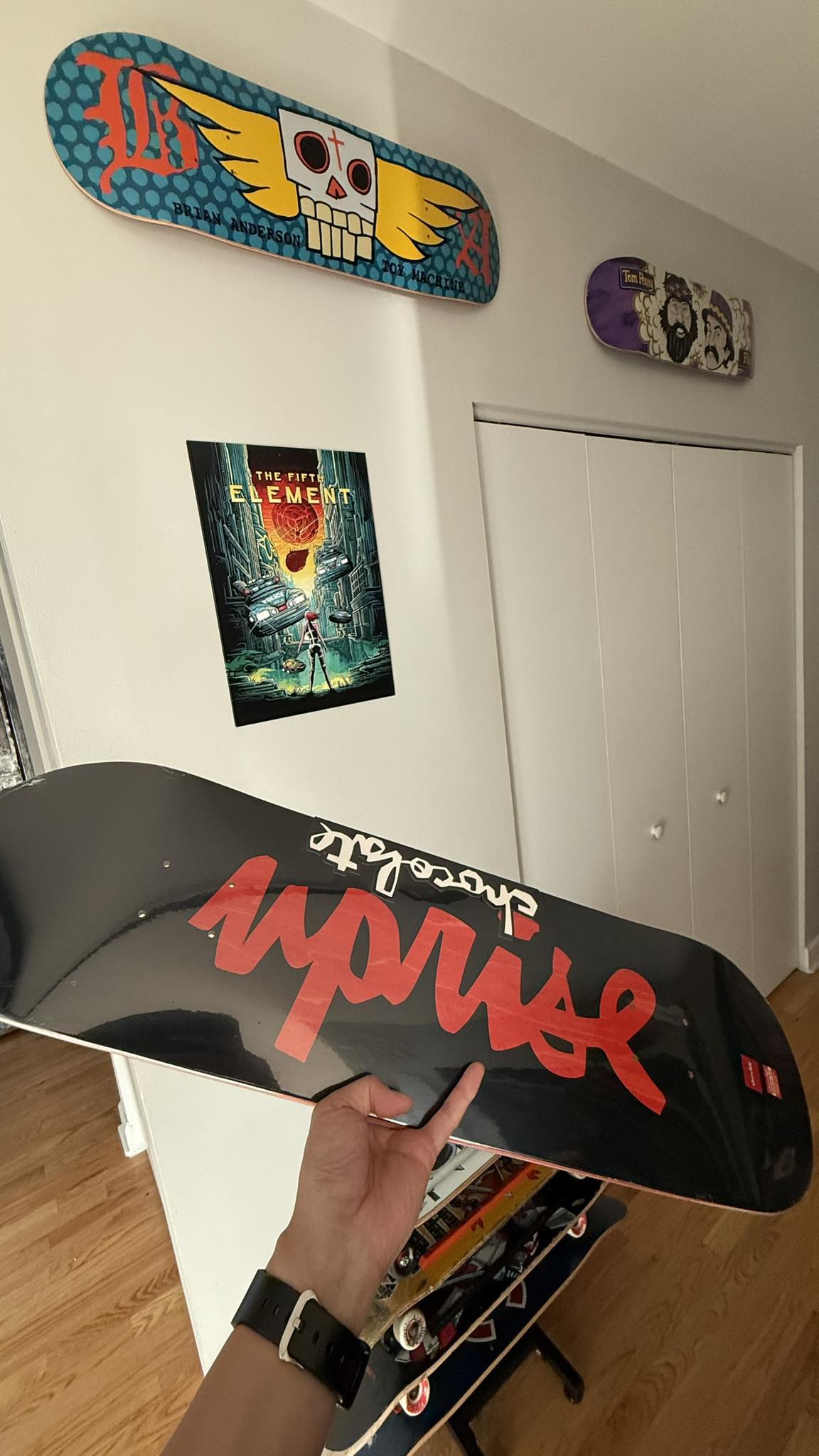 Vintage chocolate skate deck with robot graphic