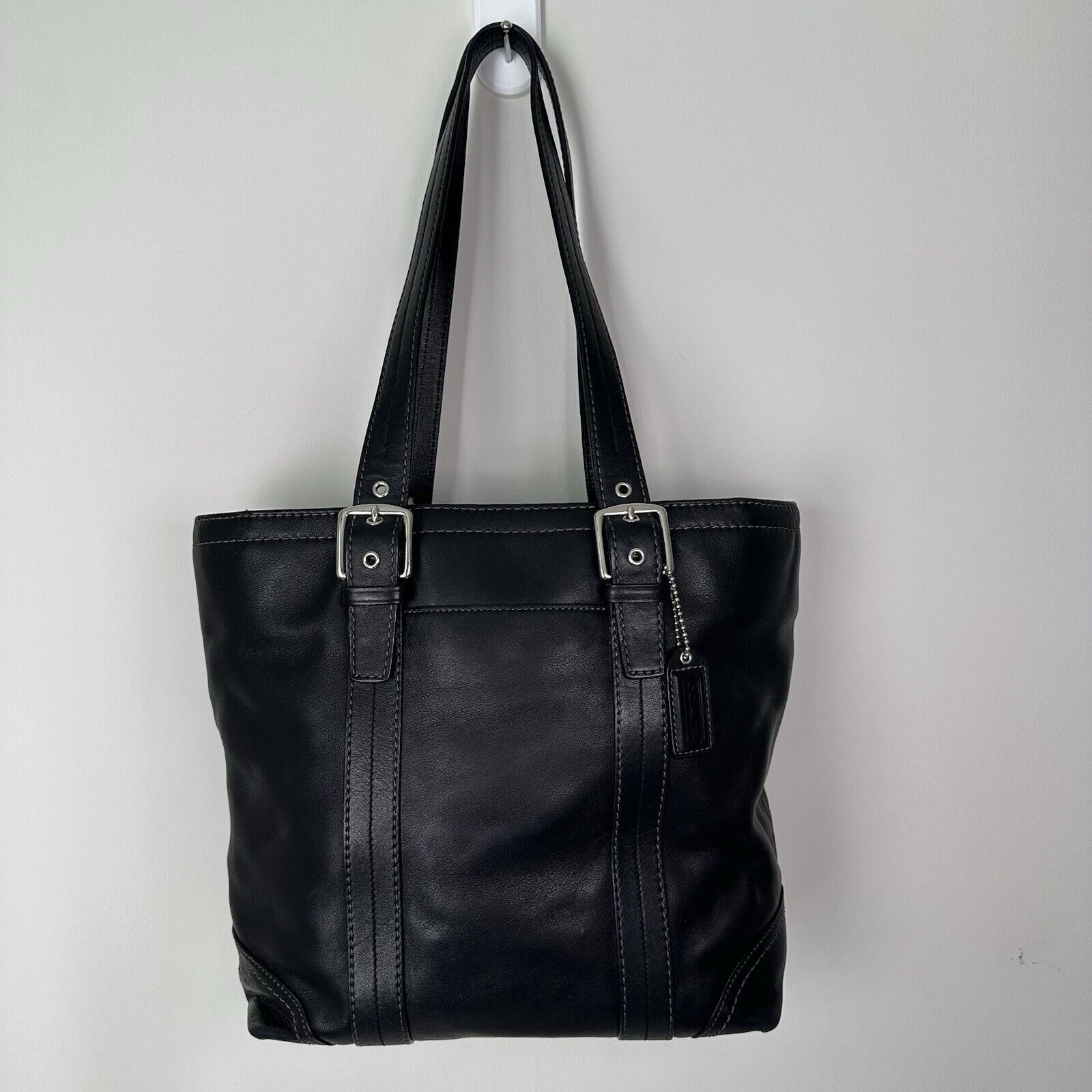 Elevate your collection with this authentic Coach Hampton tote 
