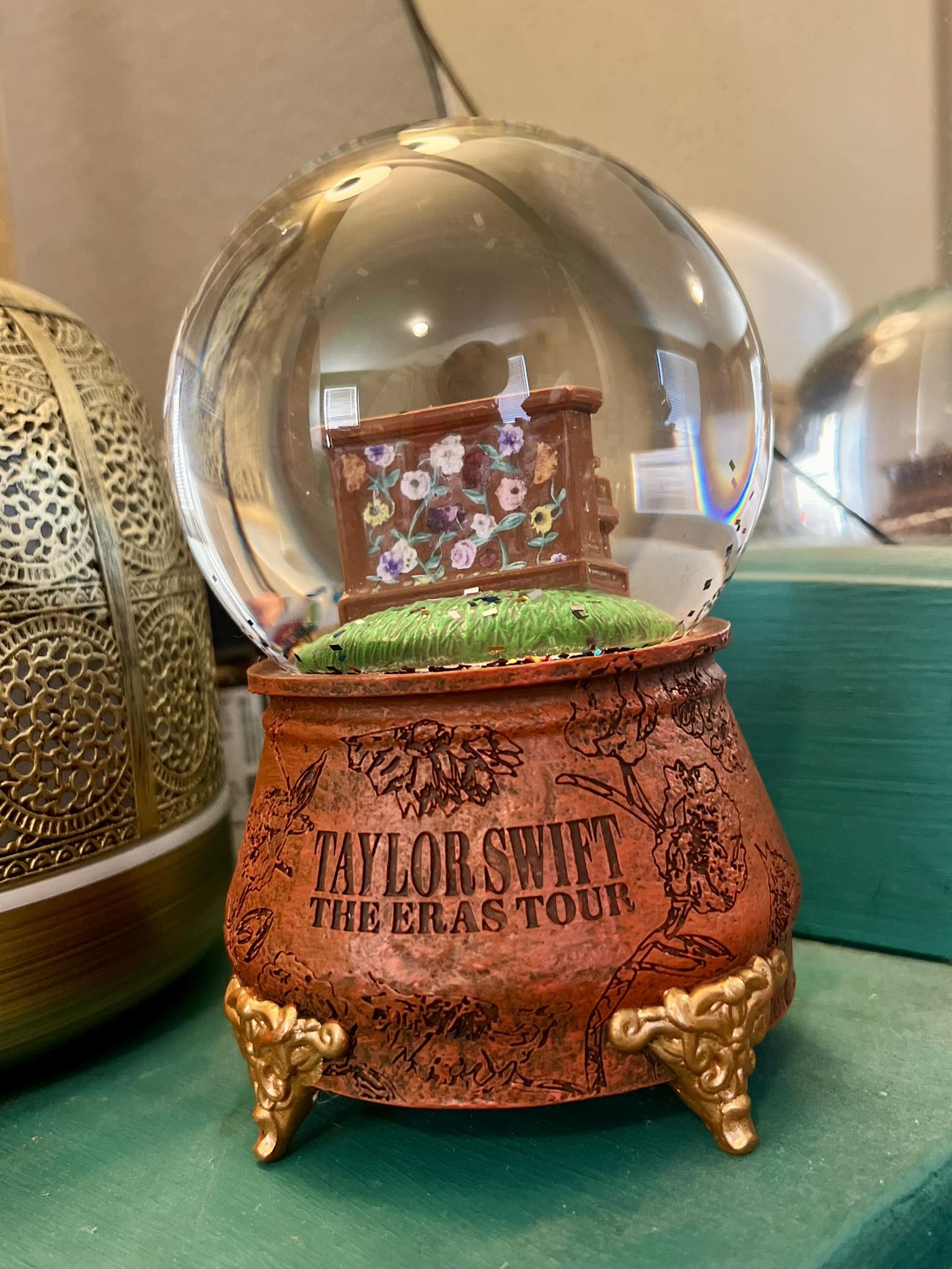 How to get music playing on Taylor Swift's Eras snowglobe?