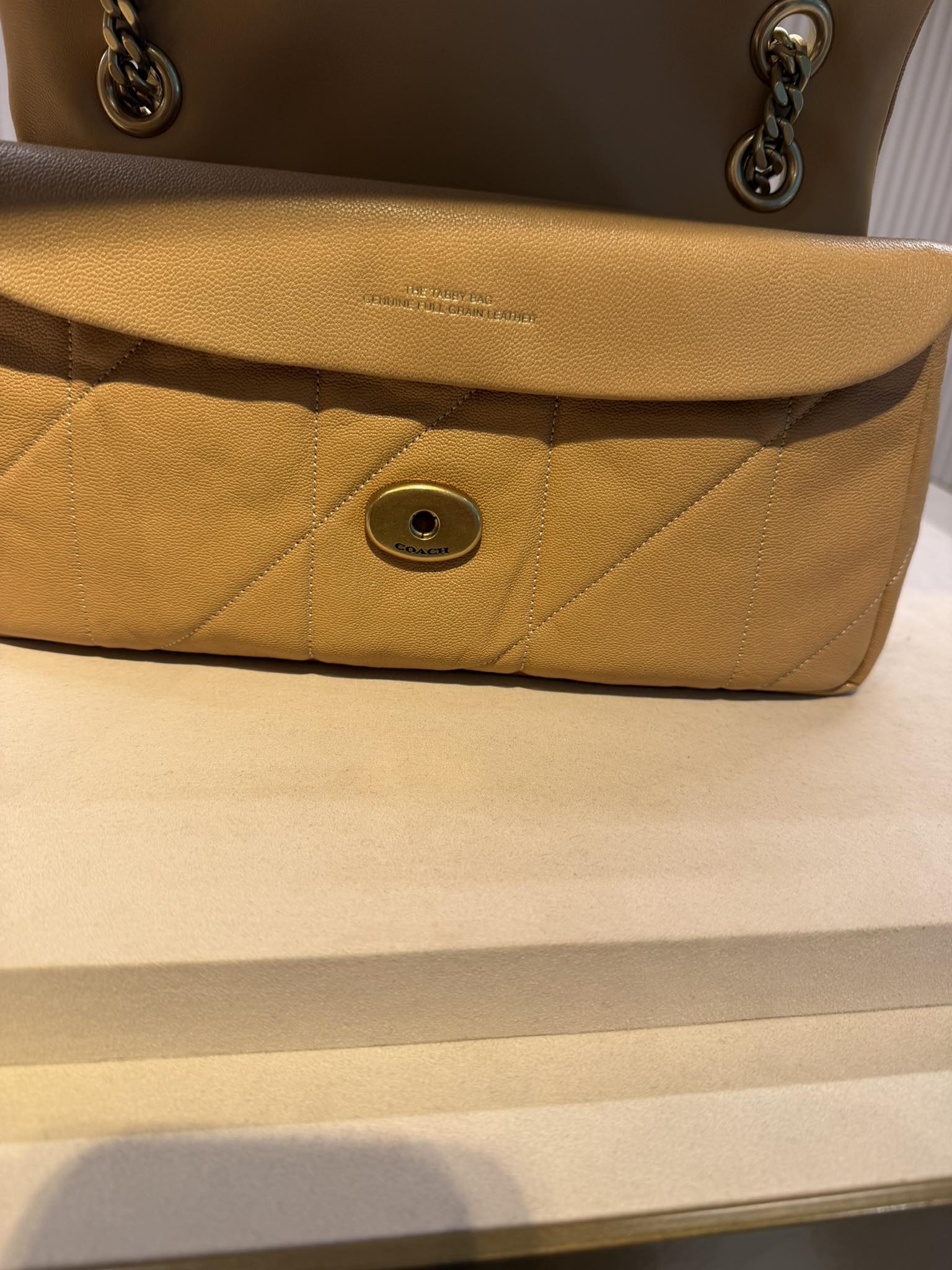 How does Coach Tabby full grain leather compare to nappa?