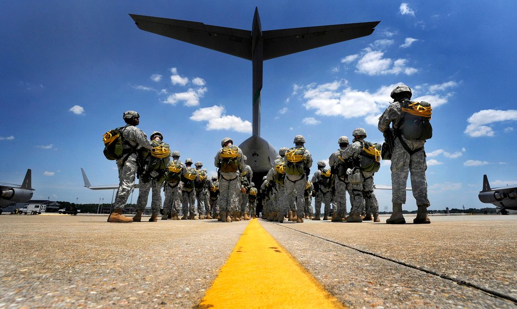 U.S. Army - U.S. Soldiers wait to board a C-17 Globemaster III cargo ...