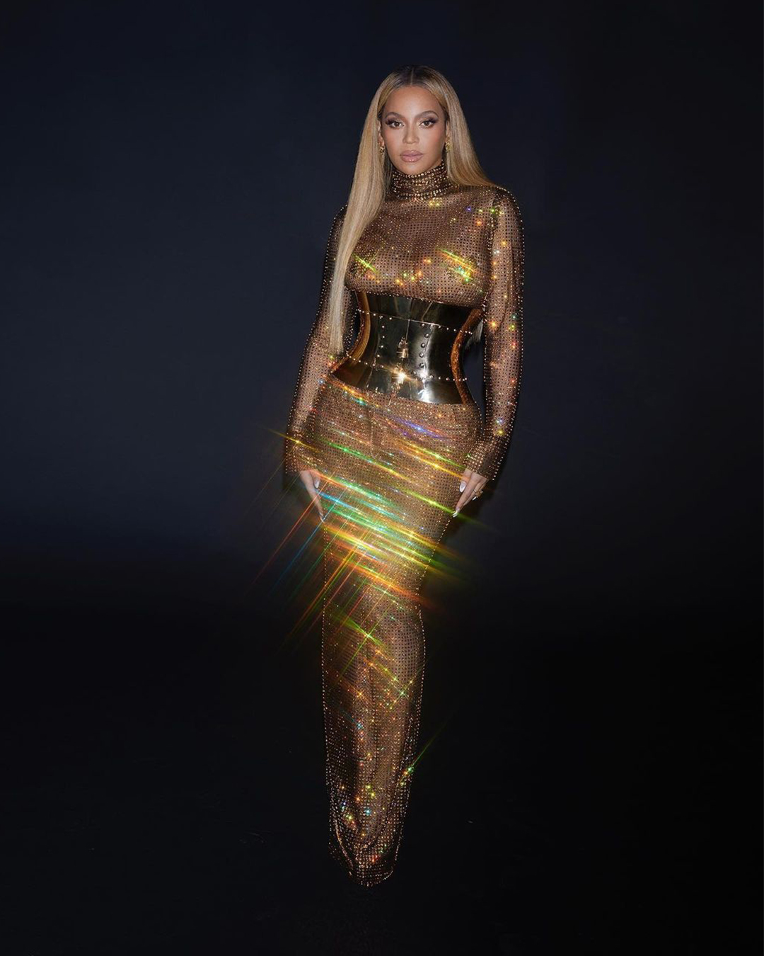 beyonce gold dress wore #DolceGabbana while hosting the Oscars “Gold Party” at Chateau Marmont in Hollywood. The singer wore a #DGFW23 Runway look composed of a long sleeve silk entirely embroidered with LowStock:43289263439923