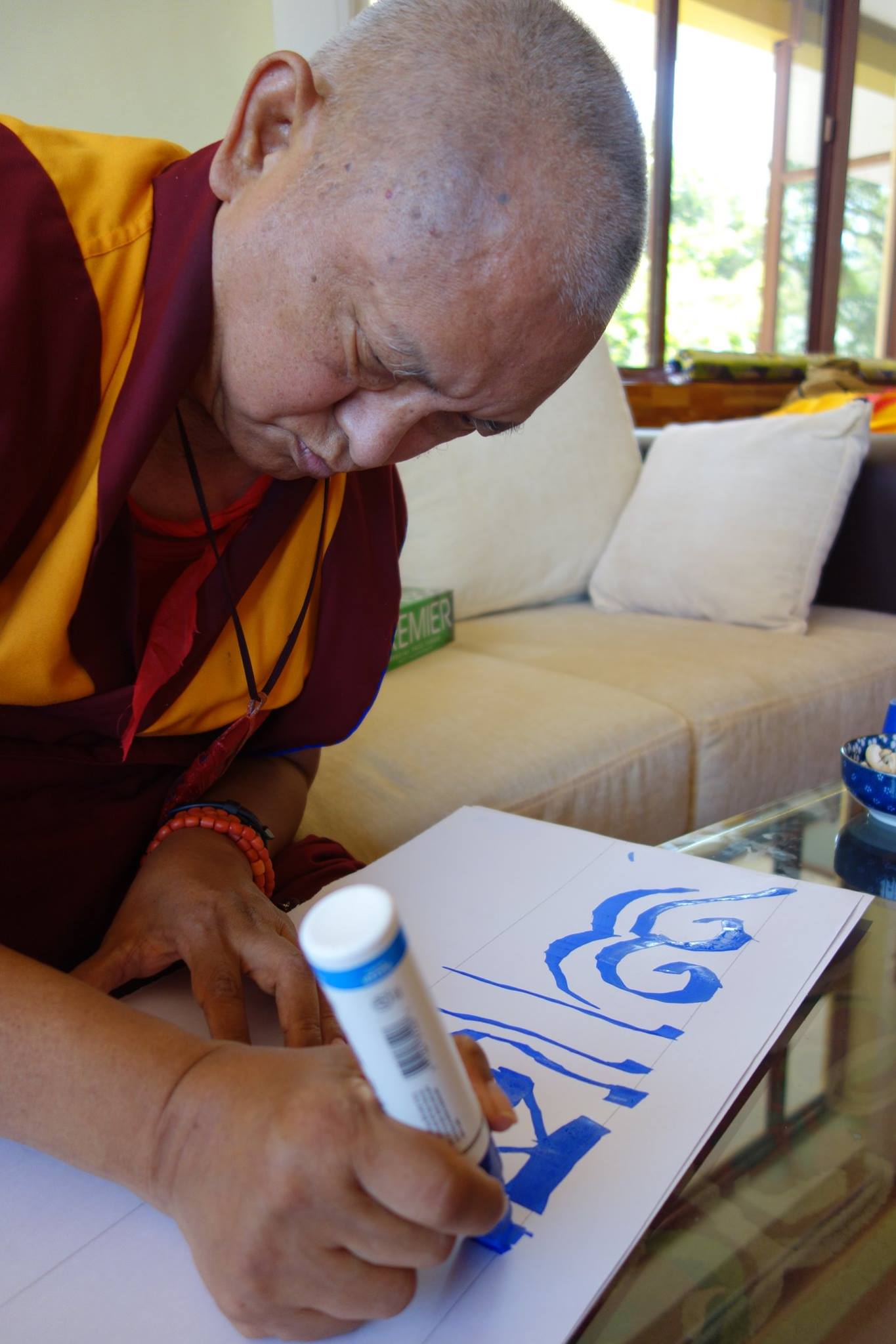Lama - Lama Zopa Rinpoche at Sera Je writing the special mantra