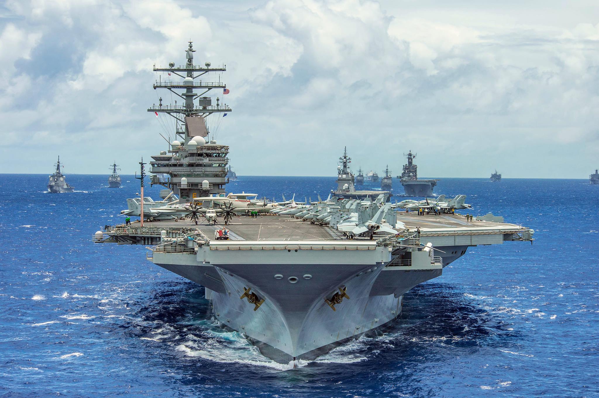 America's Navy - The aircraft carrier USS Ronald Reagan leads a ...