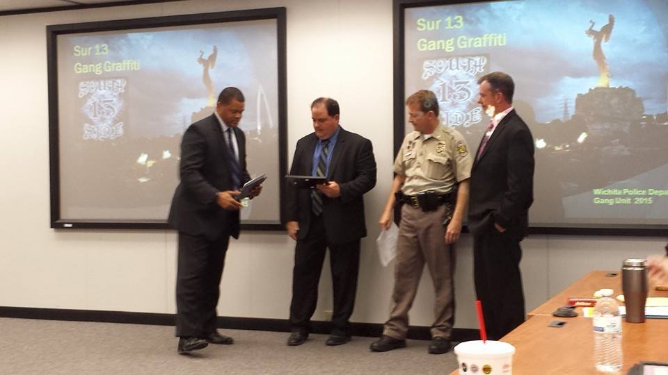 Wichita - Detective Lance Oldridge and Shawn Pichler receive the ...