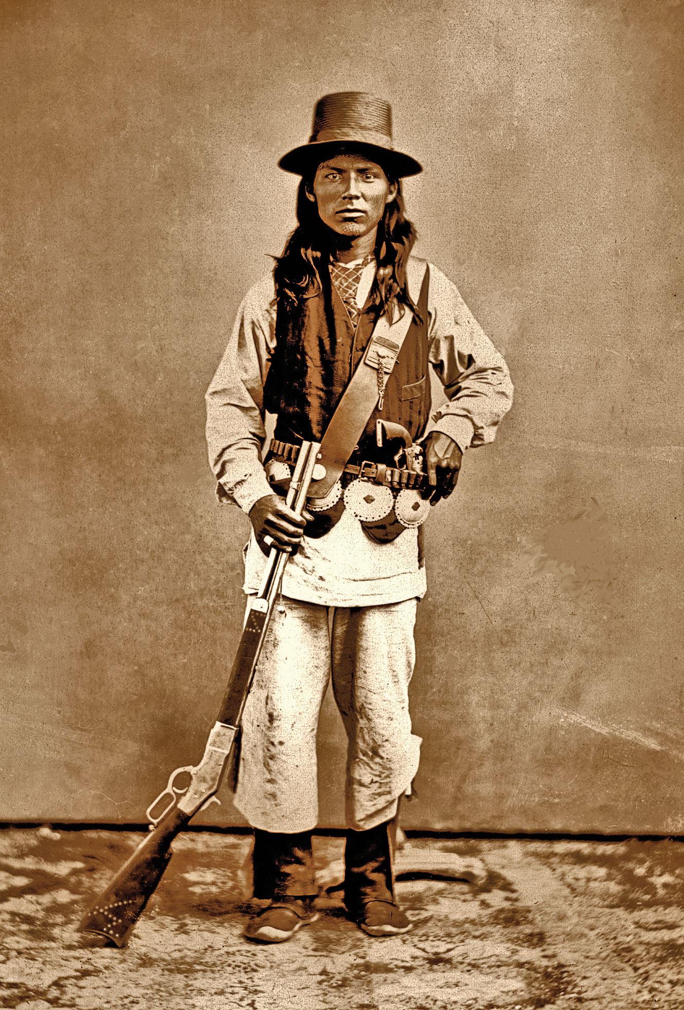 True - This Navajo fighter decorated his 1873 Winchester rifle with his