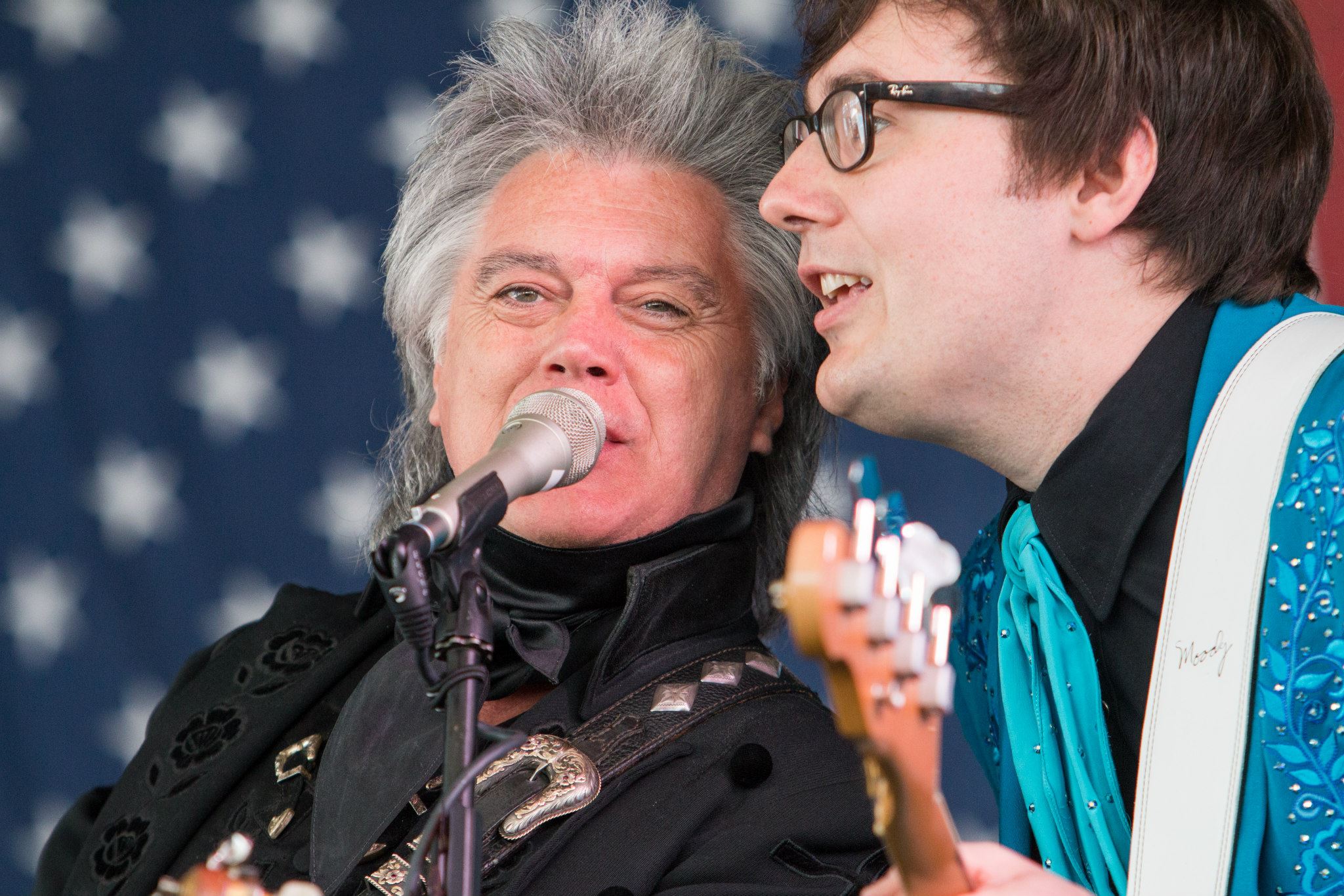 City - Singer Marty Stuart, left, performs with his band during the ...