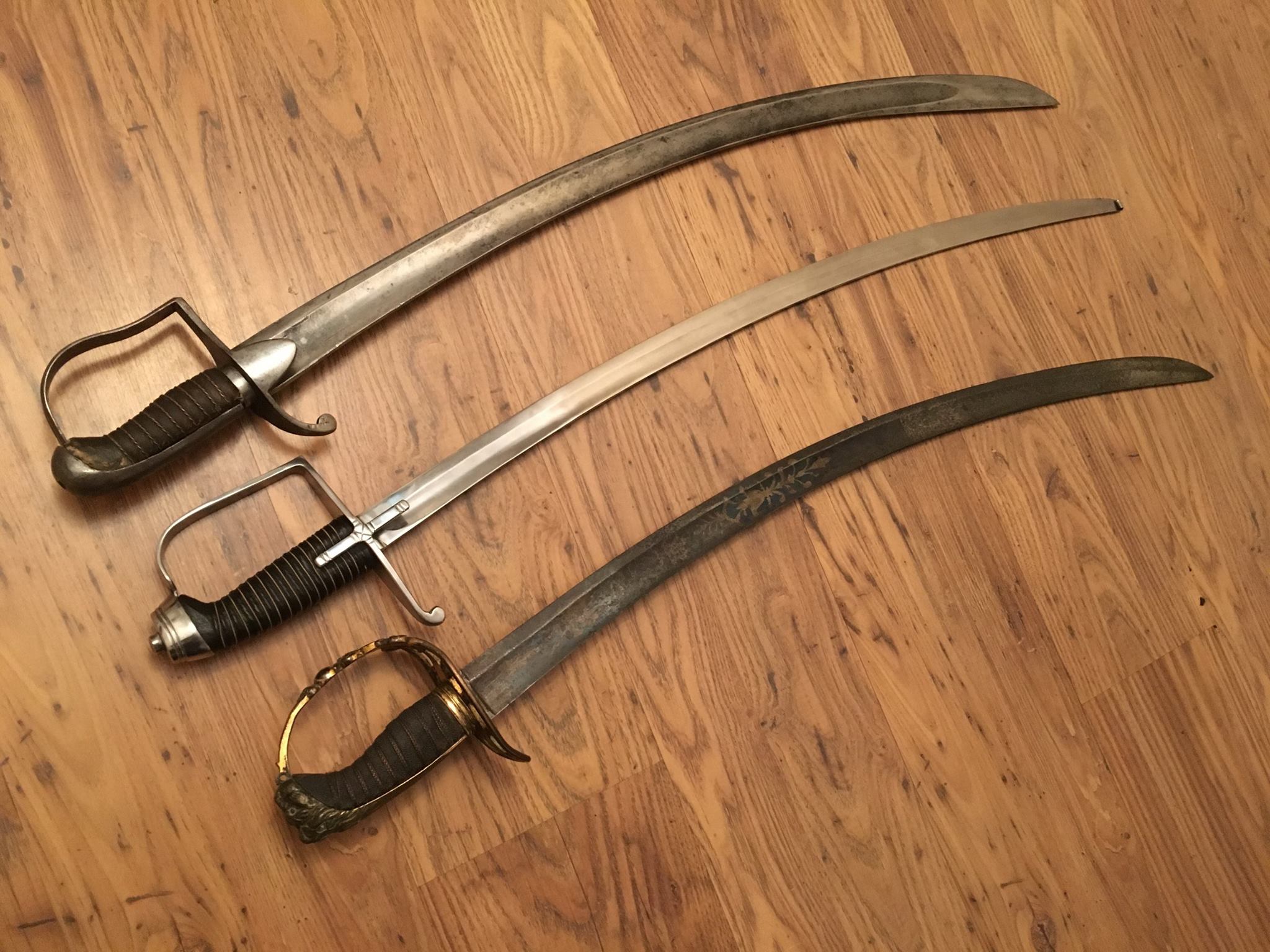 Nick - Here is the new sparring sabre I got between two original