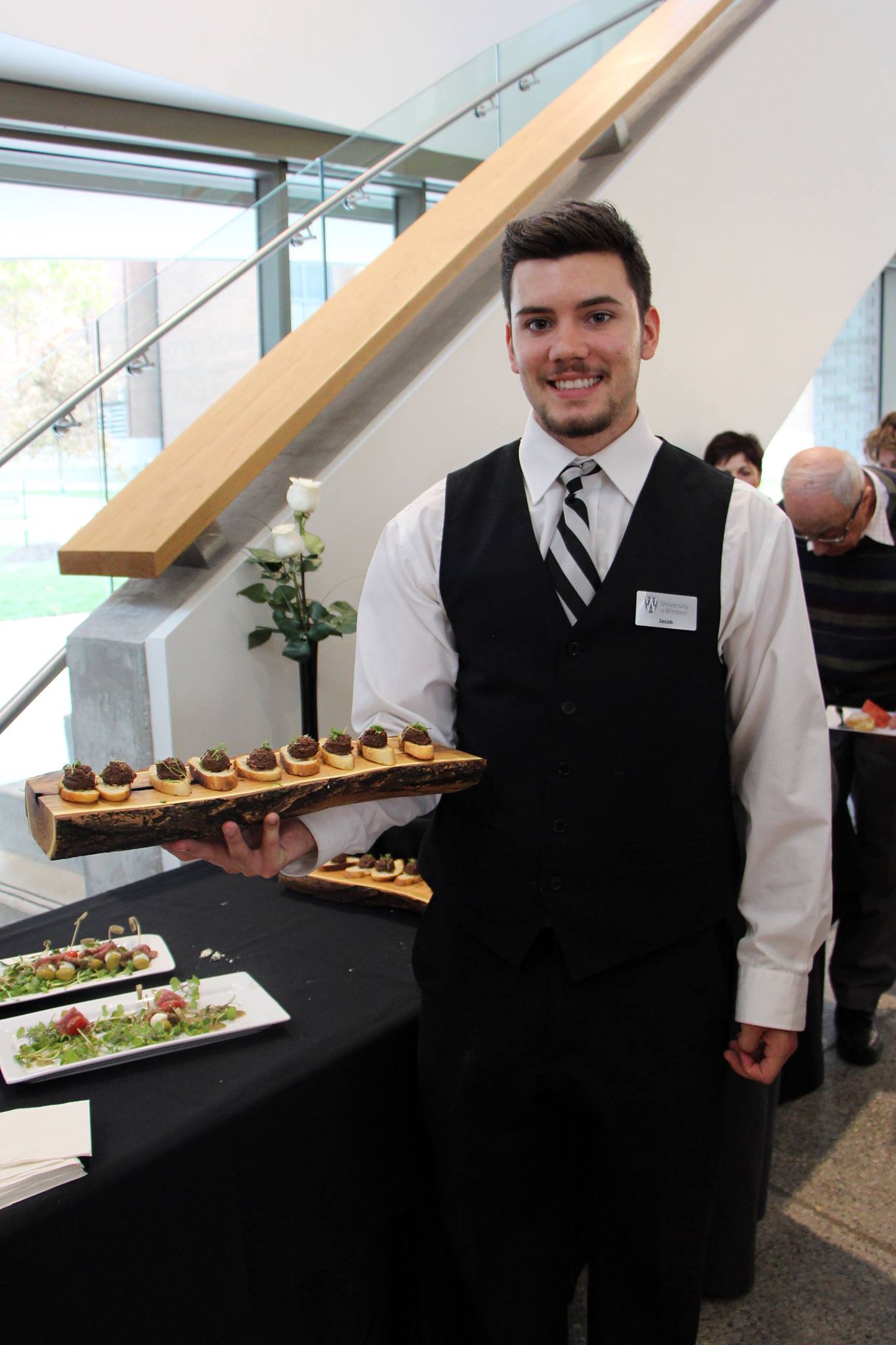 University - Jacob Ritchie serves up black olive tapenade on crostini ...