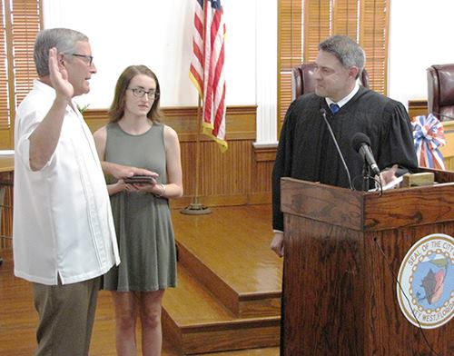 Keys - KEY WEST Utility Board Member Tim Root, left, was sworn into ...