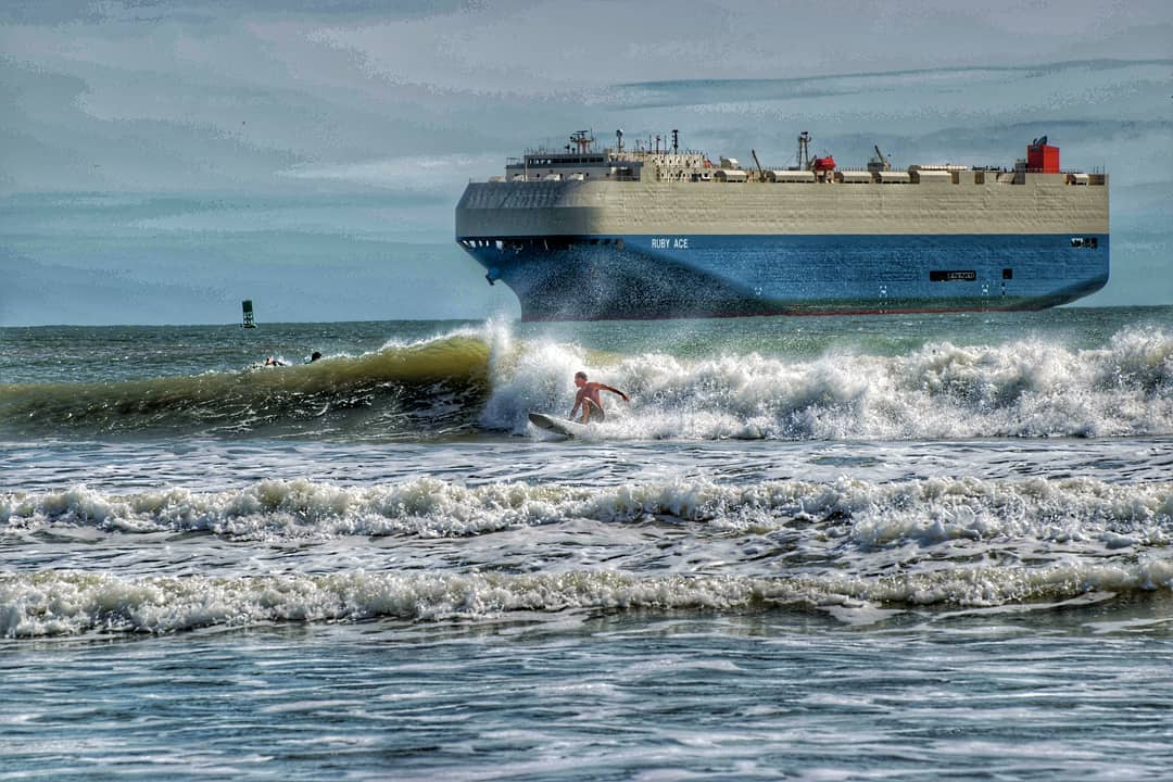 Port - This is the Ro-Ro ship Ruby Ace while a surfer enjoys Port ...