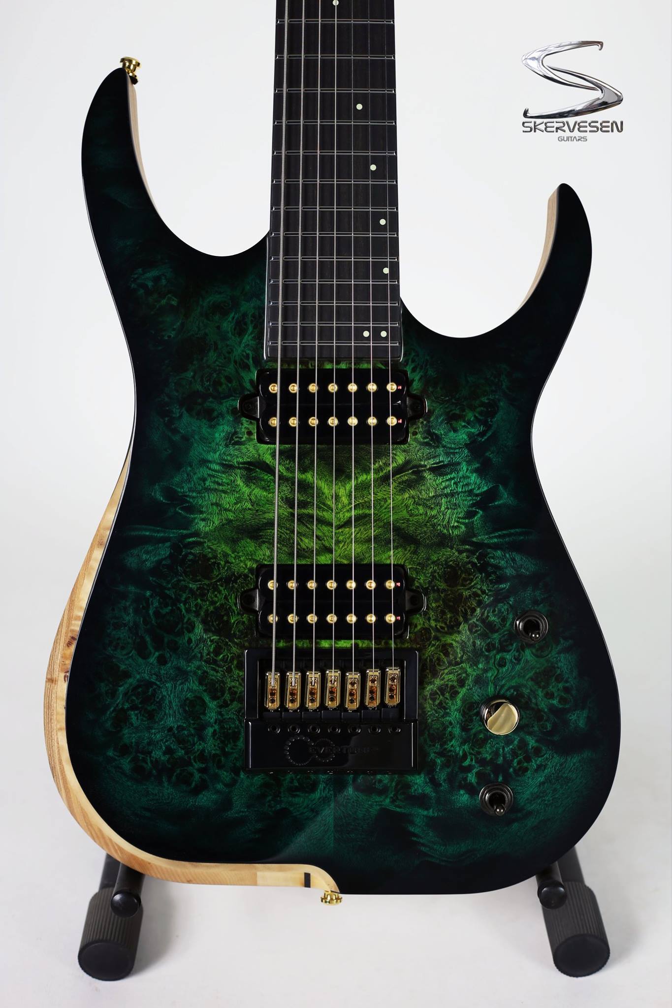 Skervesen Guitars Custom Raptor 8 with Gooby PLS inlay. Pics Via