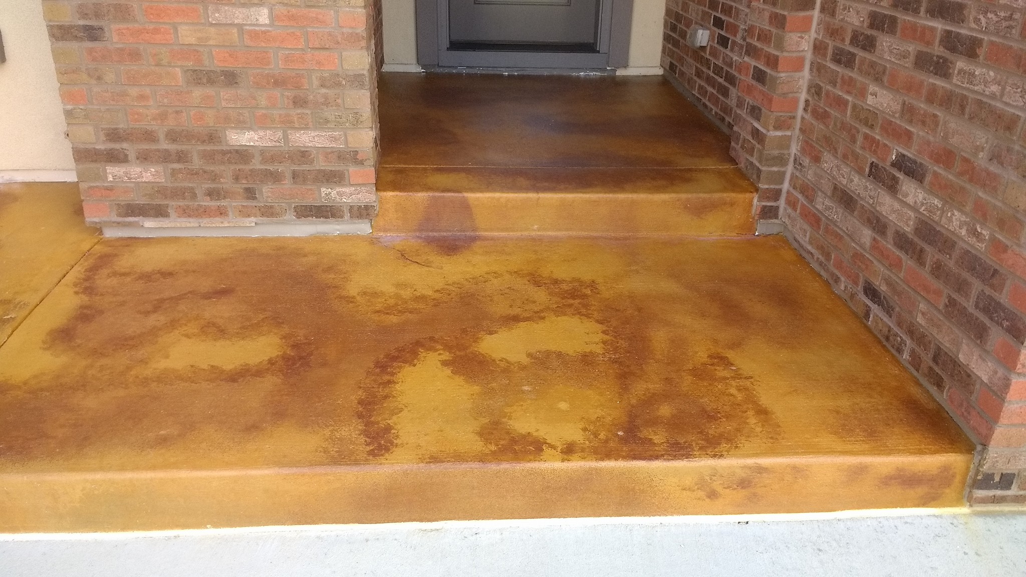 Our latest acid stain on front porch... - STP Custom Concrete