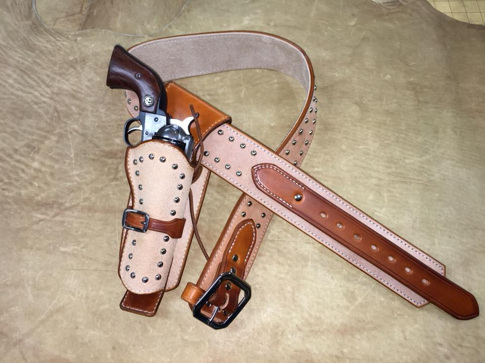 T STAR LEATHER - A nickle spotted roughout fast draw rig...