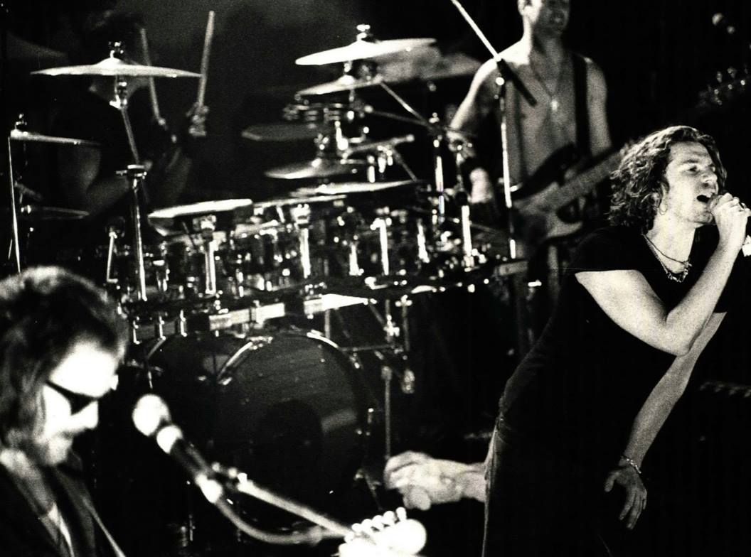 This month in 1993, INXS performed live at Barker Hangar in Santa