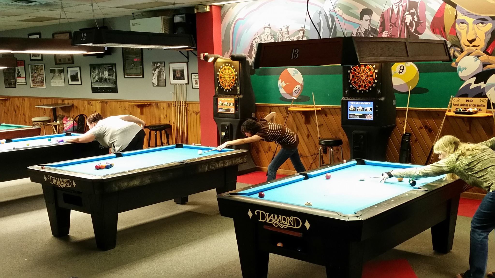 Bison Billiards - Full house, all 18 tables going, half...