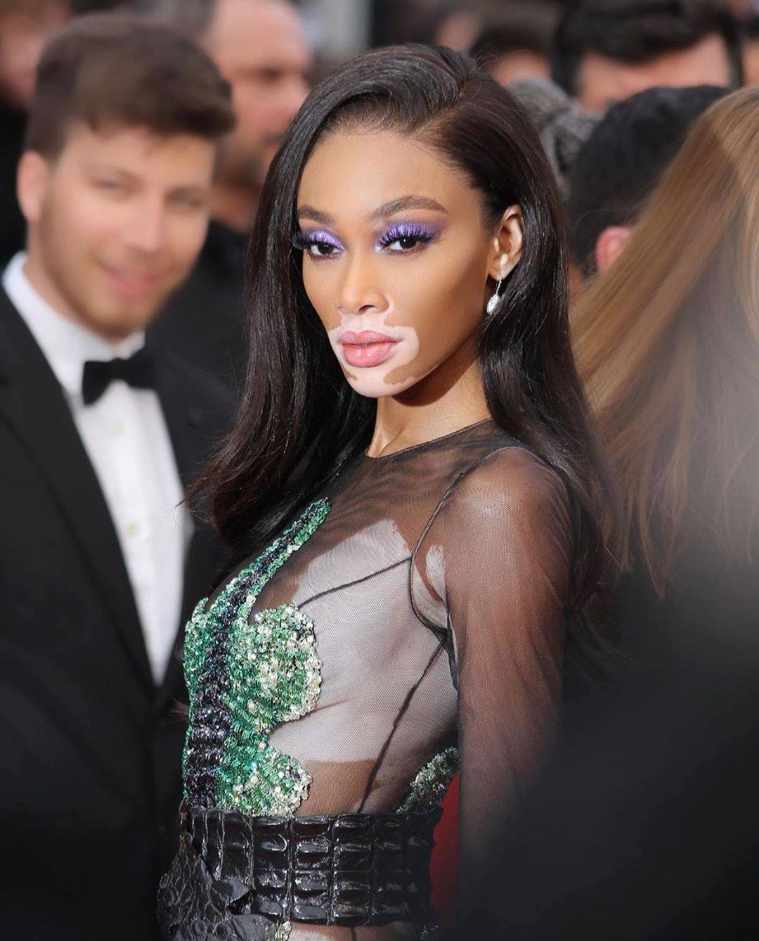 Winnie Harlow at the British Fashion Awards in a delicate, entirely hand-embroidered #AtelierVersace gown with soft feather accents on the hemline. http://vrsace.co/celebrities