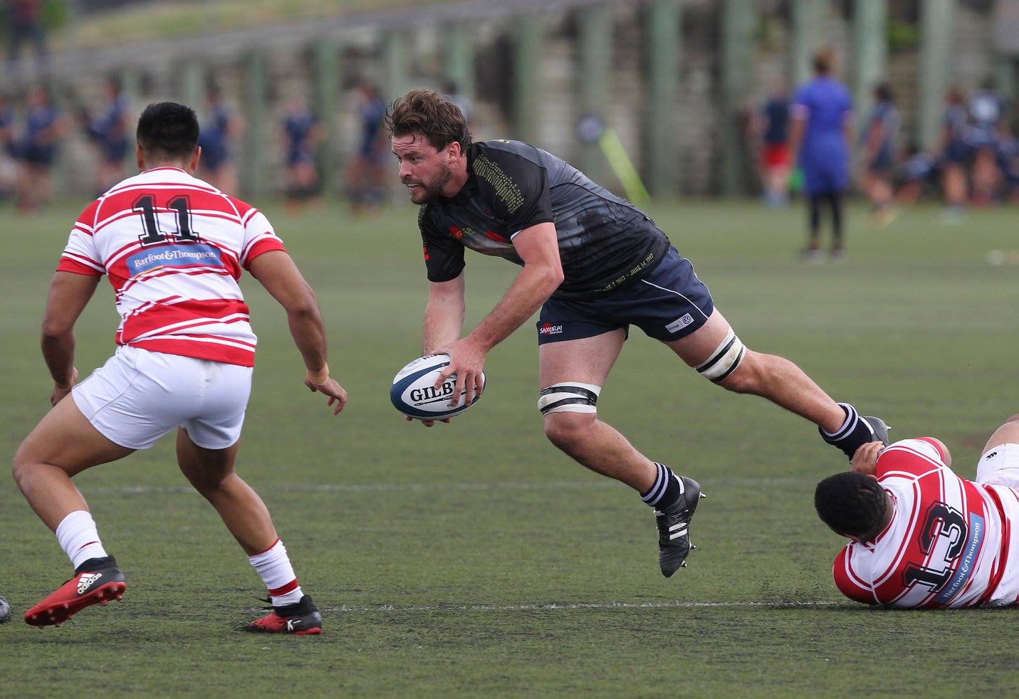 Auckland Rugby - College Rifles' Jeremy Innes looks to offload the ball ...