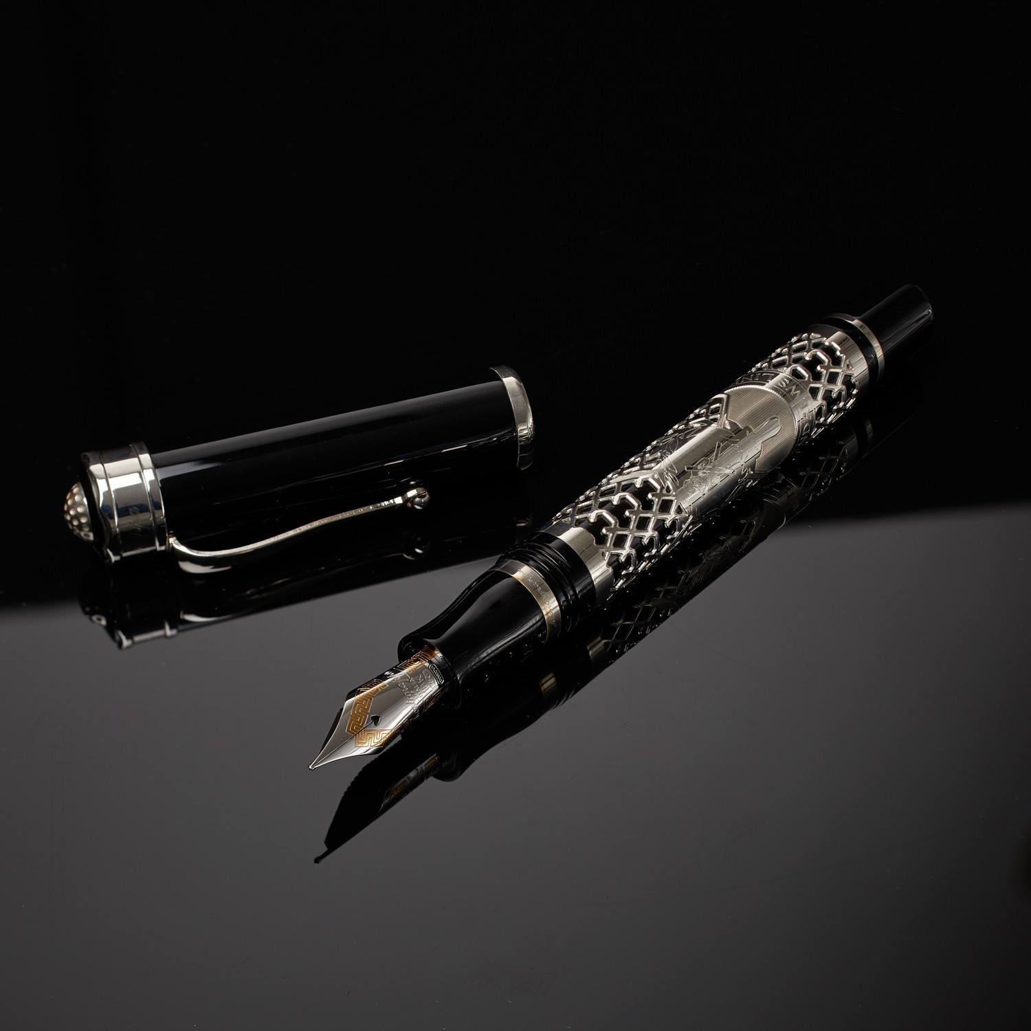 Montegrappa 1912 in silver and a two tone fine nib.