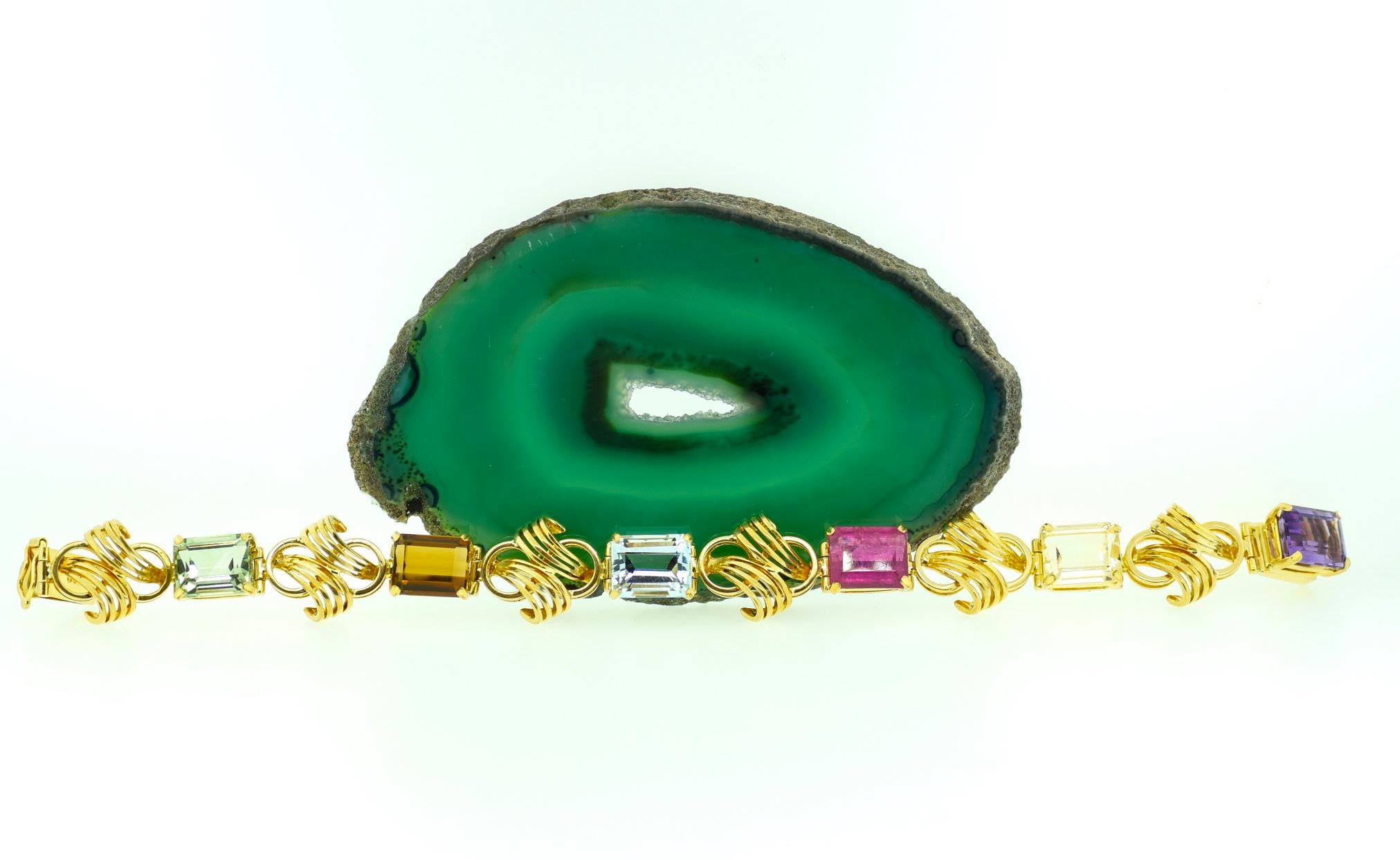Dublin Jewelers A rare 19k yellow gold gemstone bracelet...