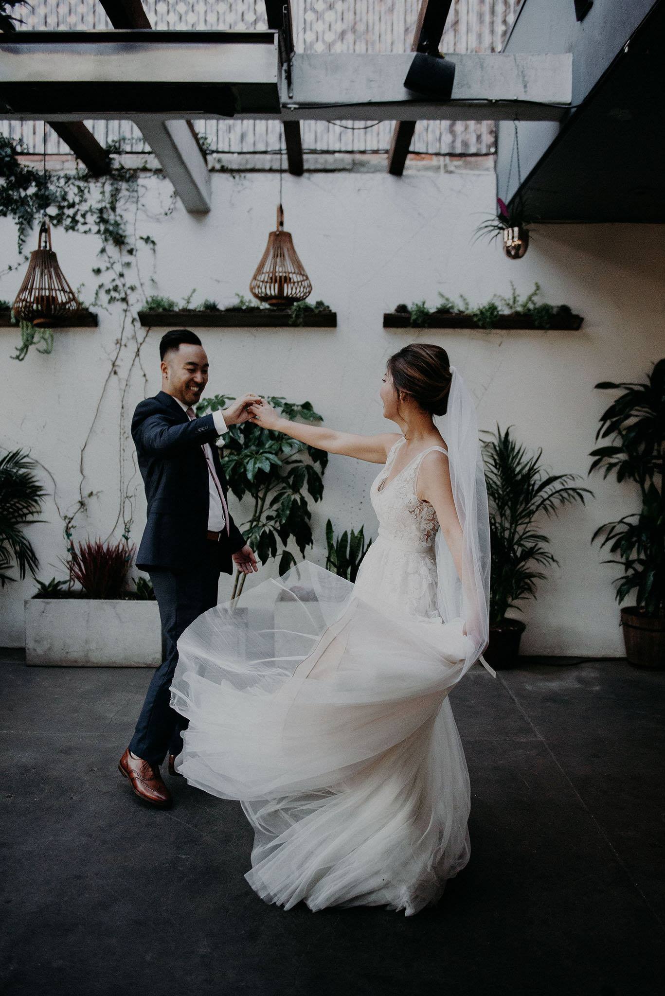 You know we're suckers for a good brunch wedding! After a breezy plant-filled ceremony and a cozy food-focused reception, Sue and Theo ended theirs with an intimate sunset session on the roof