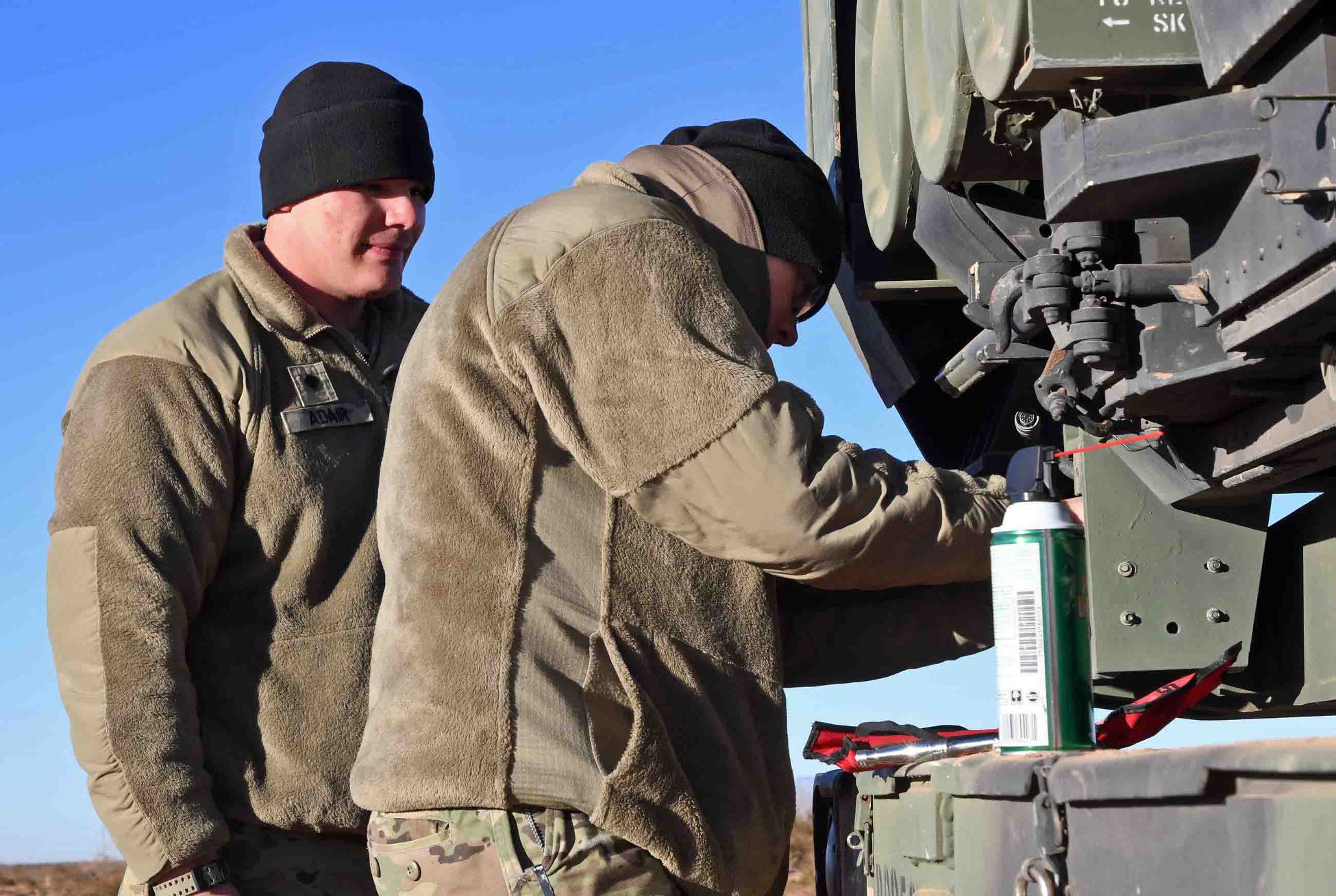 South - U.S. Army Spc. Tim Adair and Sgt. Jessica Anderson, both M270 ...