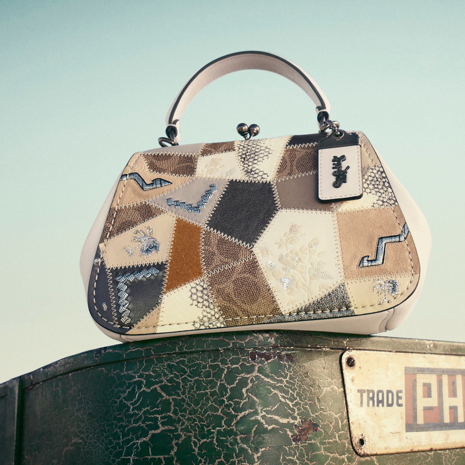 Vintage structure, patchwork print and our Signature canvas in 