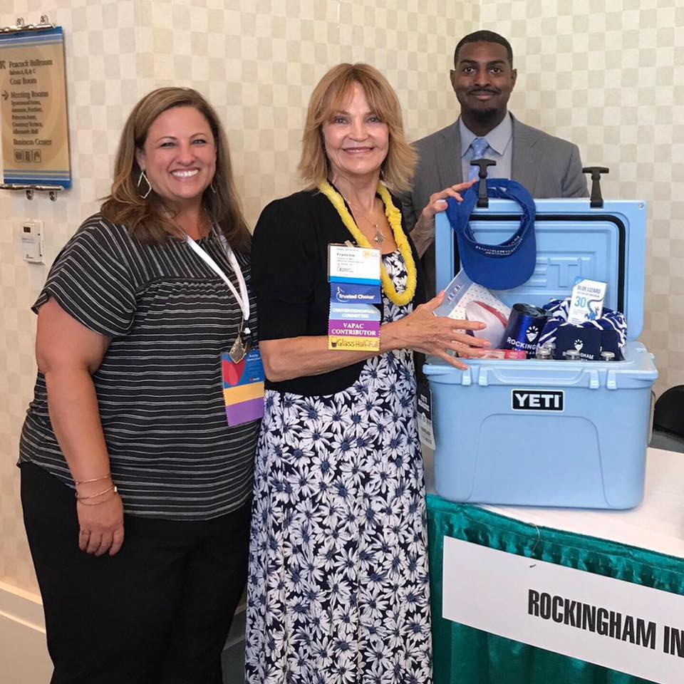 Tonya and Shawn presenting the Yeti... - Rockingham Insurance