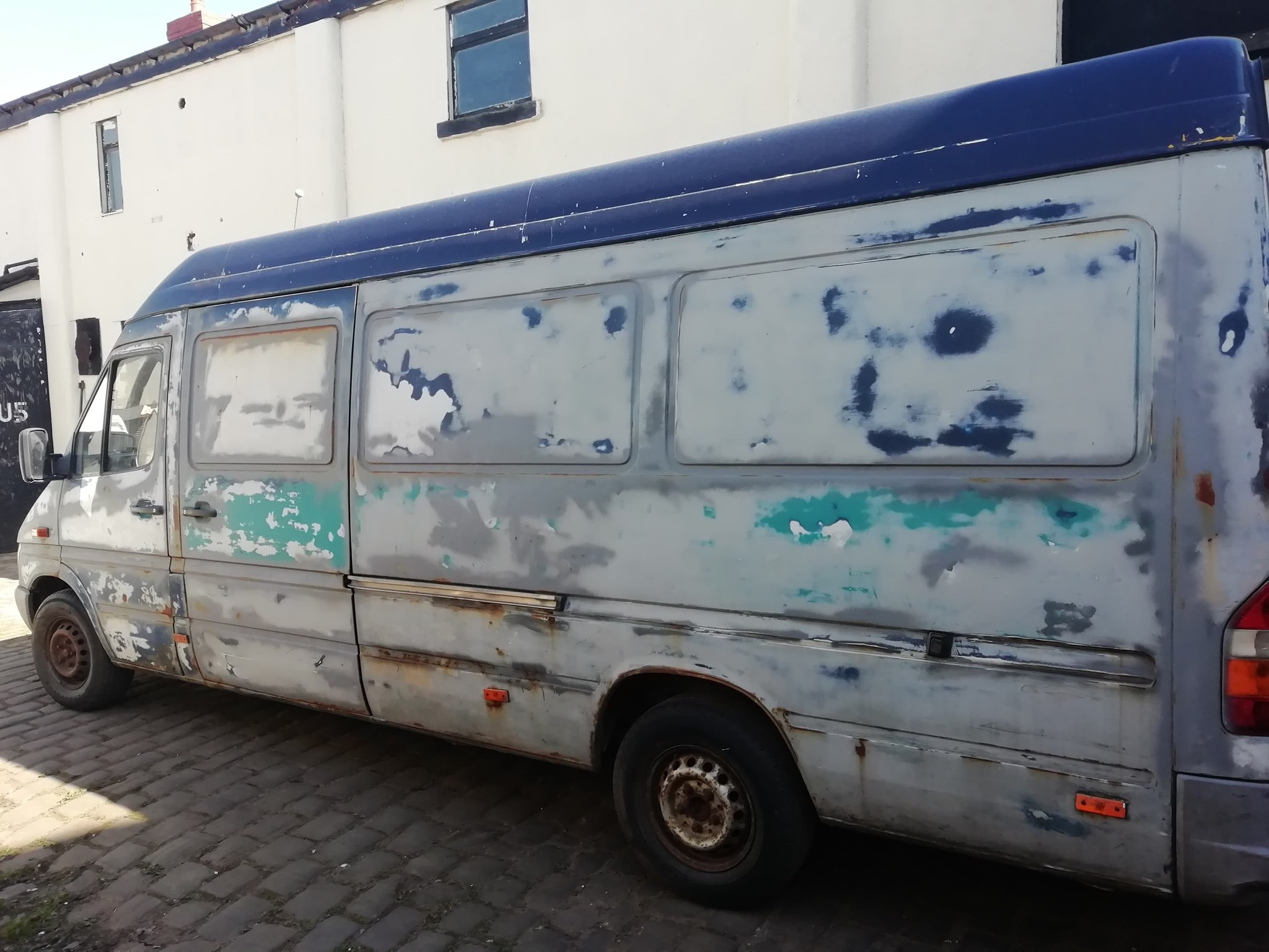 Finally getting around to having our new van lettered by Eben and