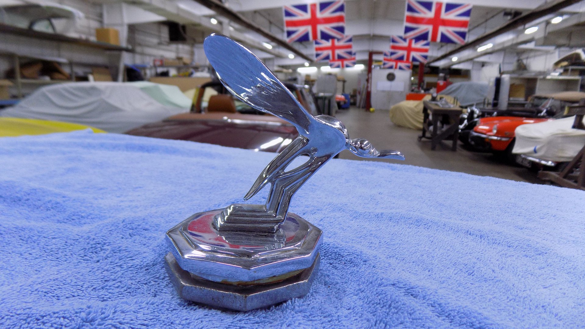 A flying mosquito mascot for the radiator cap. We're unsure of who ...