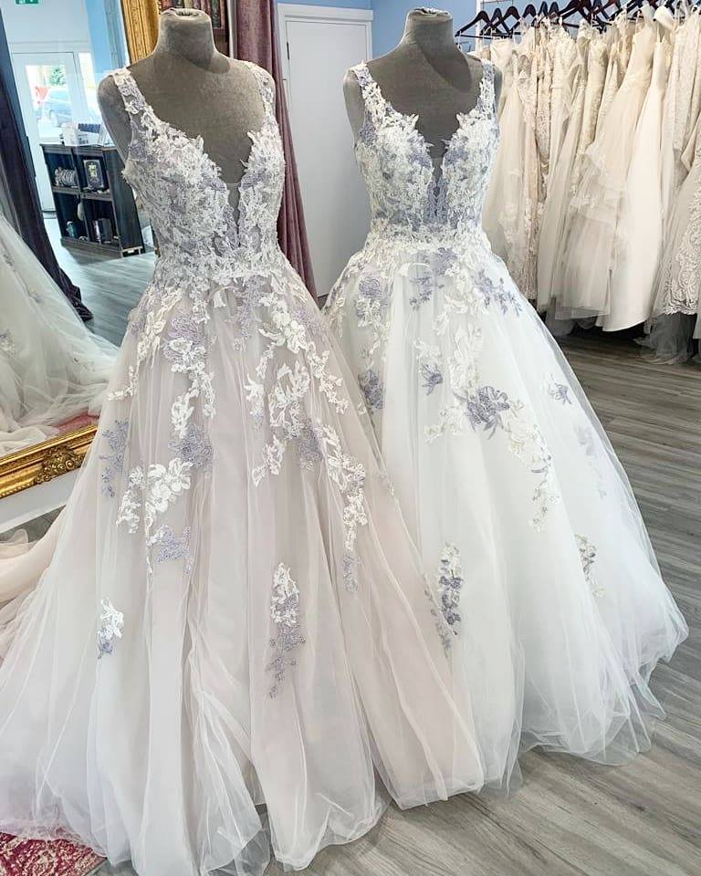 tanzanite bridesmaid dresses Our gown is loved by brides all over the world and available in so many different color options! 💙 Would you wear the Hydrangea/Mocha (Left) or Ivory/Hydrangea (Right)? ✨ Let us neck BOSS Womenswear dress