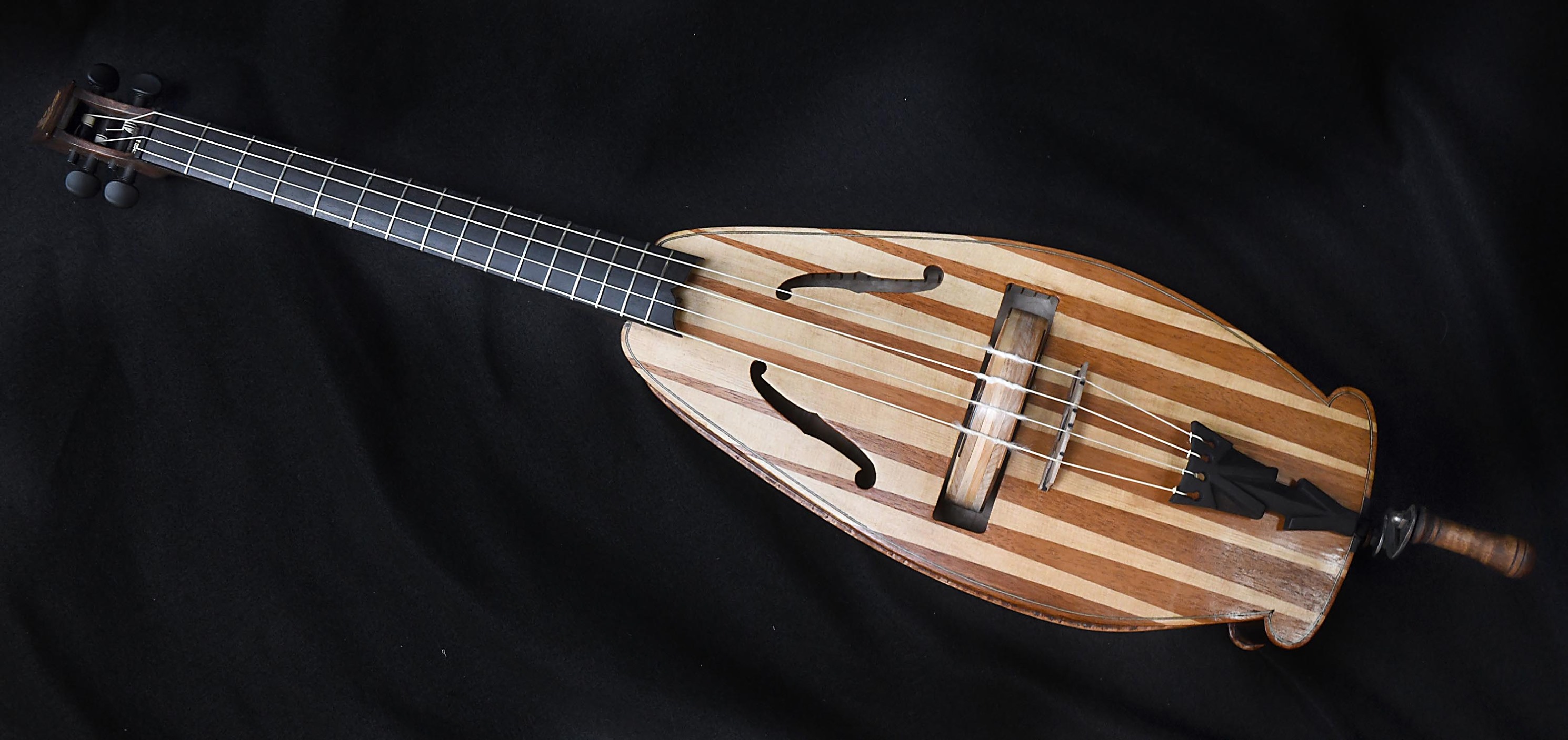 Mosaic art exhibition made from repurposed violins