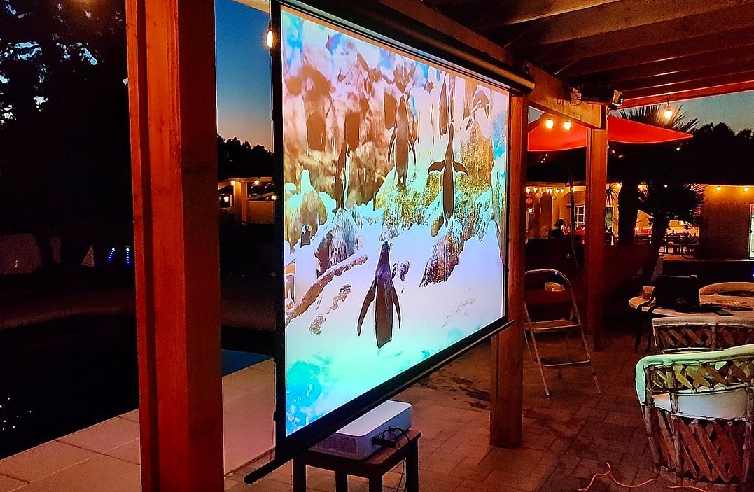 Elite Screens - Outdoor Home Theater setup by the pool... | Facebook